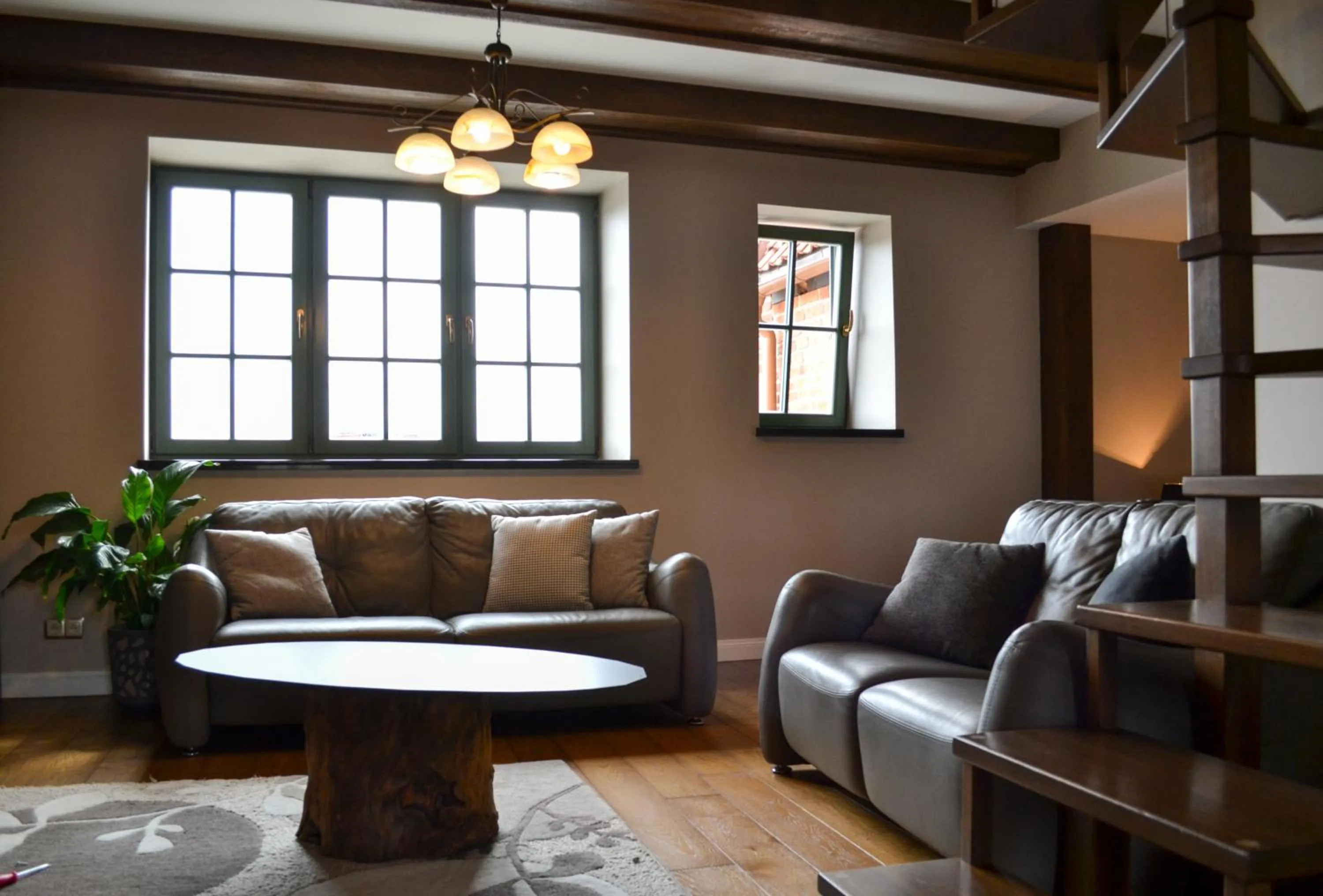 Living room in Komturia Old Town by Fahrenheit