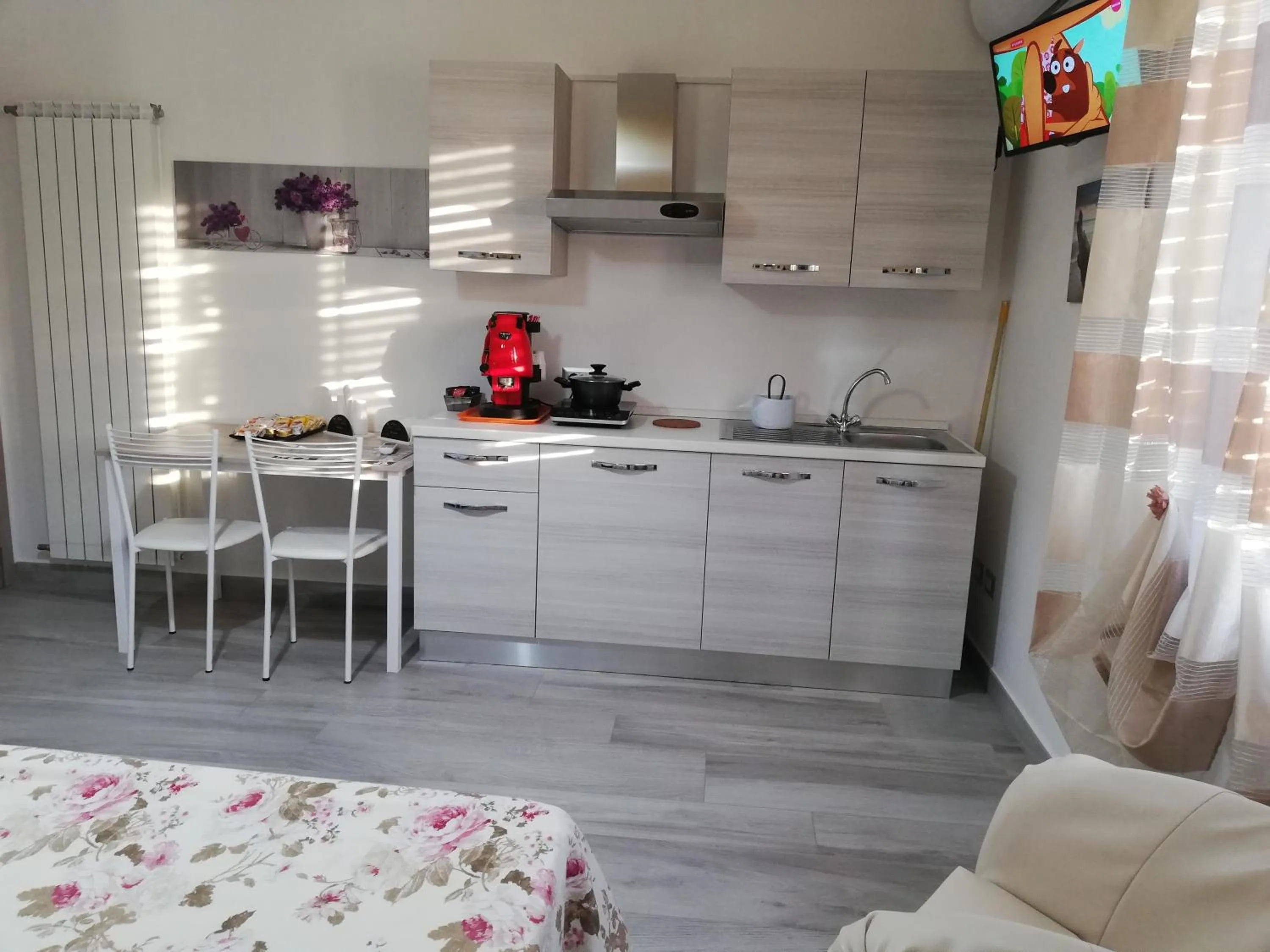 Kitchen or kitchenette in B&B Villa Rosa