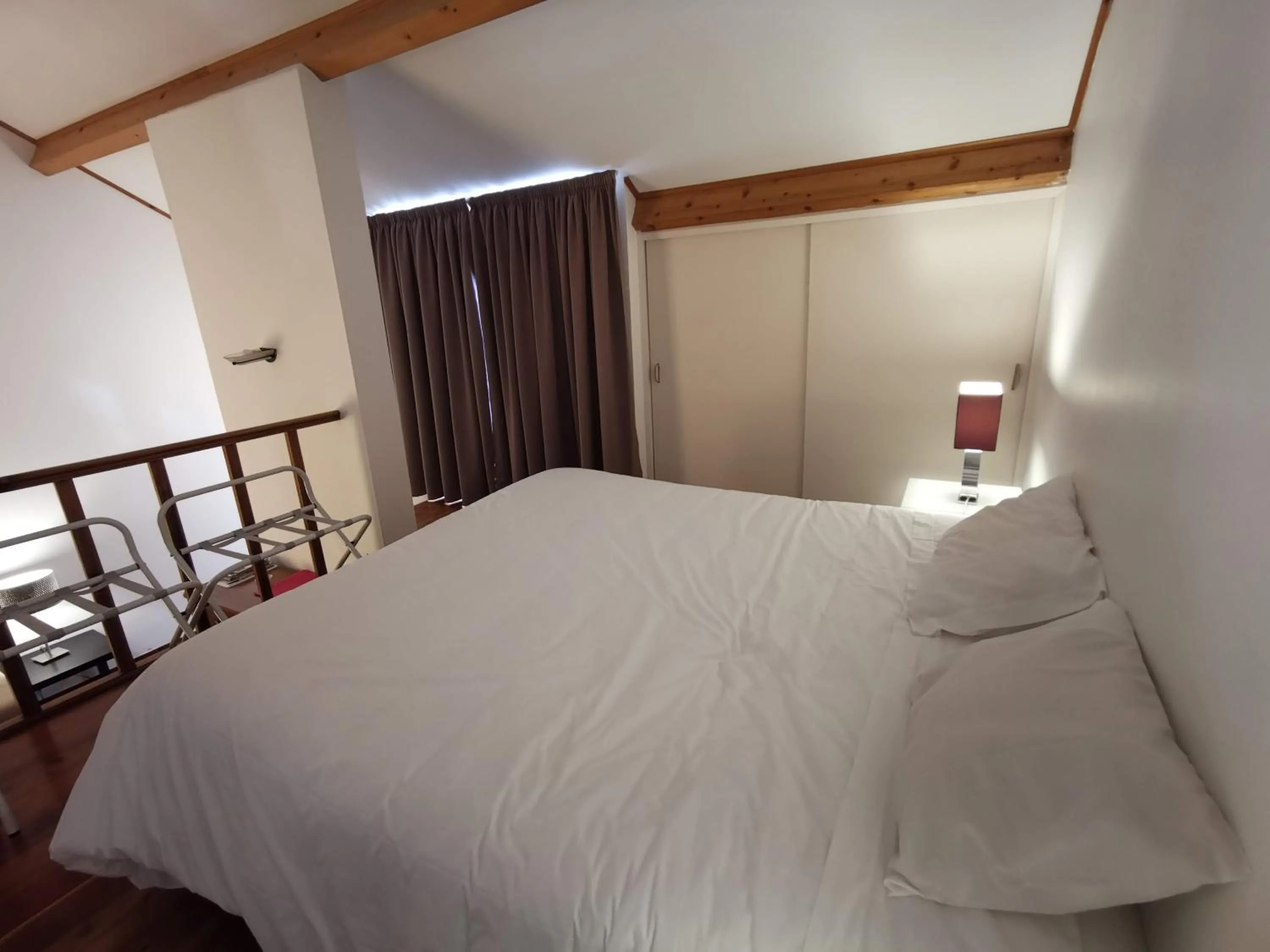 Bed in Apartamentos da Galé