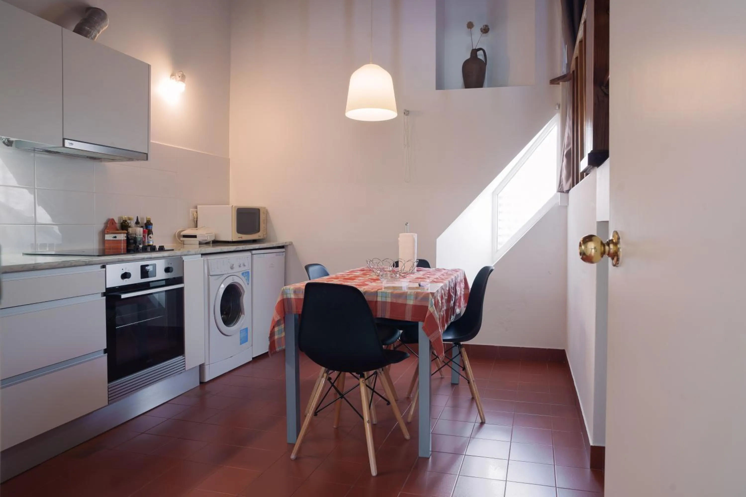 Kitchen or kitchenette in Apartamentos da Galé