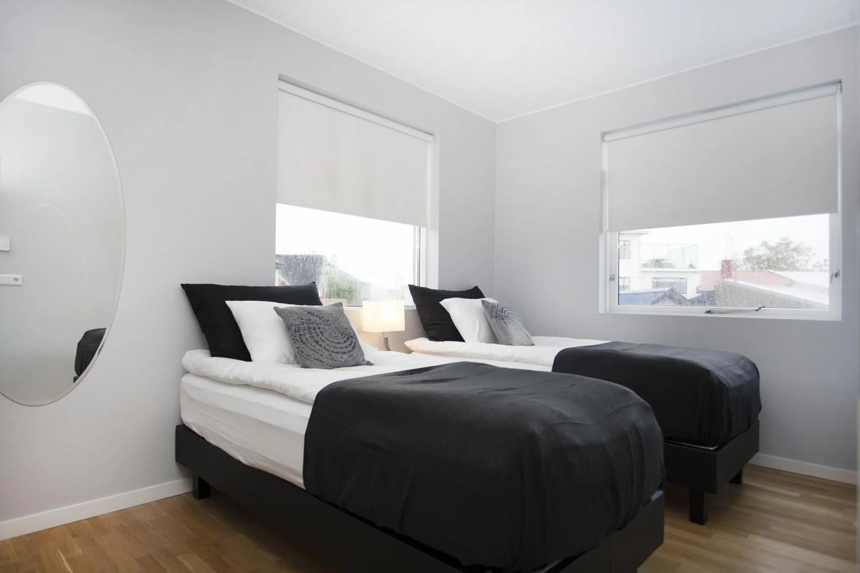 Bed in Blue Luxury Apartments