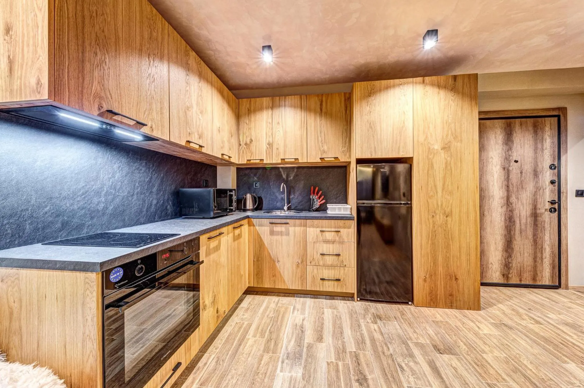 Kitchen or kitchenette in Grand Resort Pamporovo Apartments