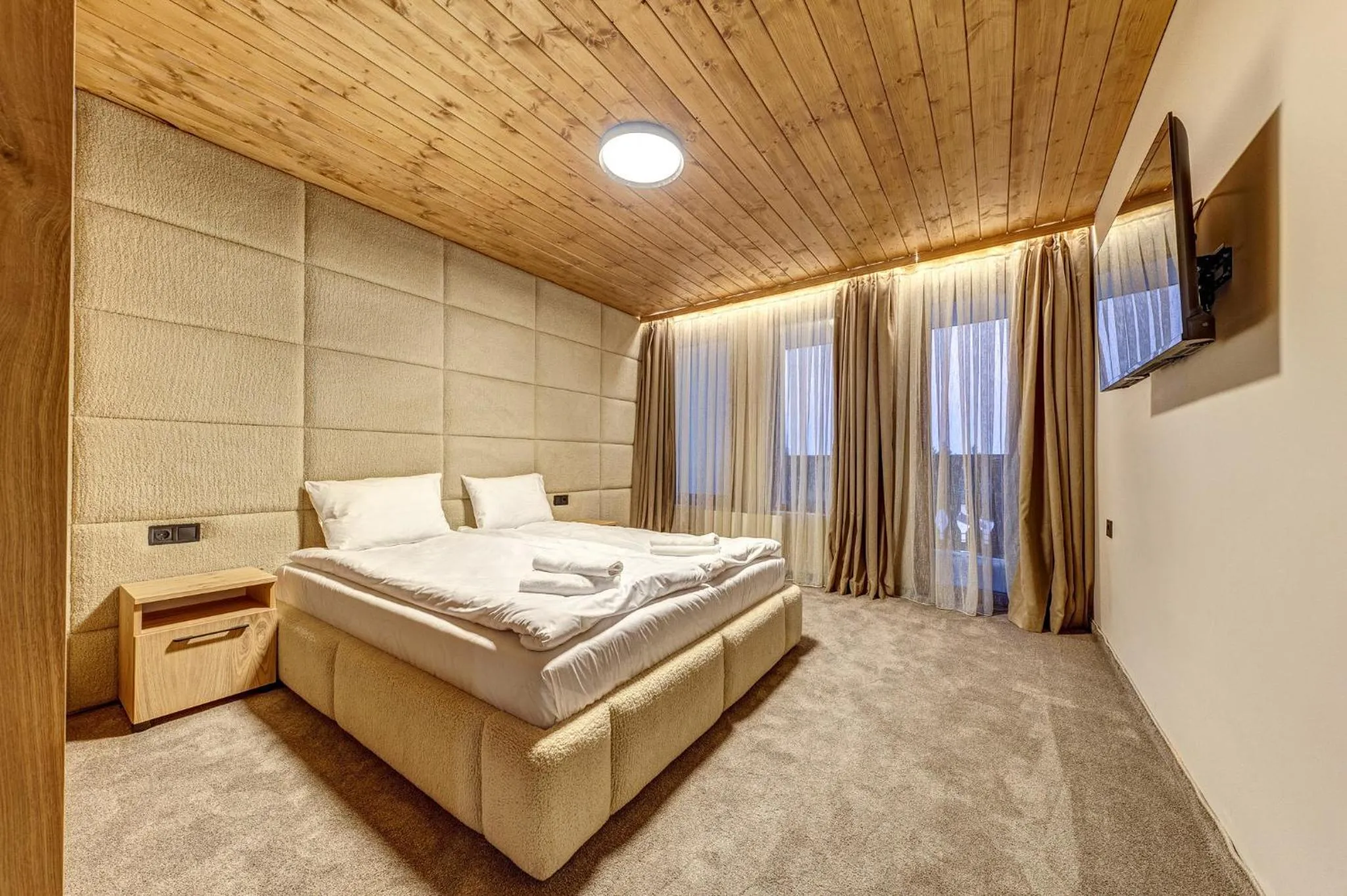 Bed in Grand Resort Pamporovo Apartments