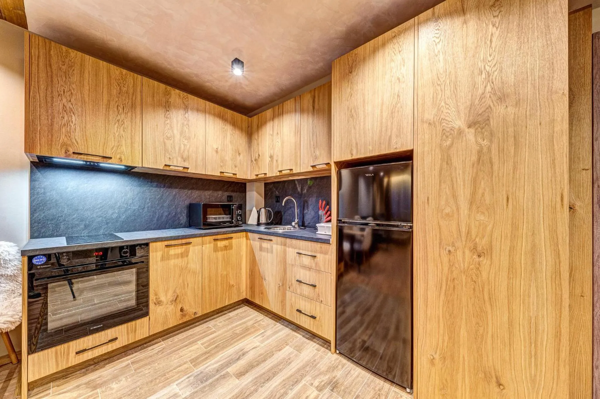 Kitchen or kitchenette in Grand Resort Pamporovo Apartments