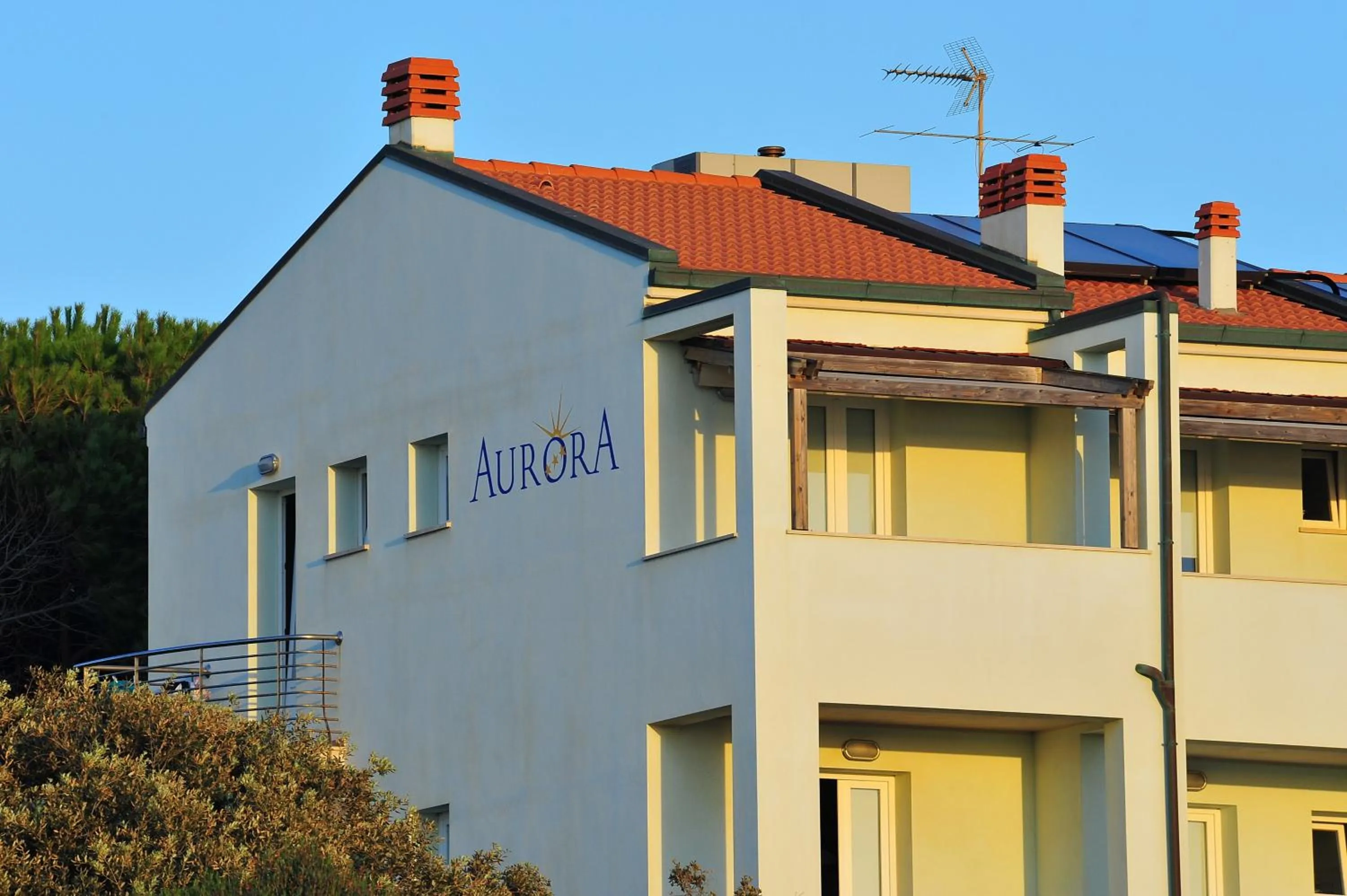 Property logo or sign in Hotel Aurora