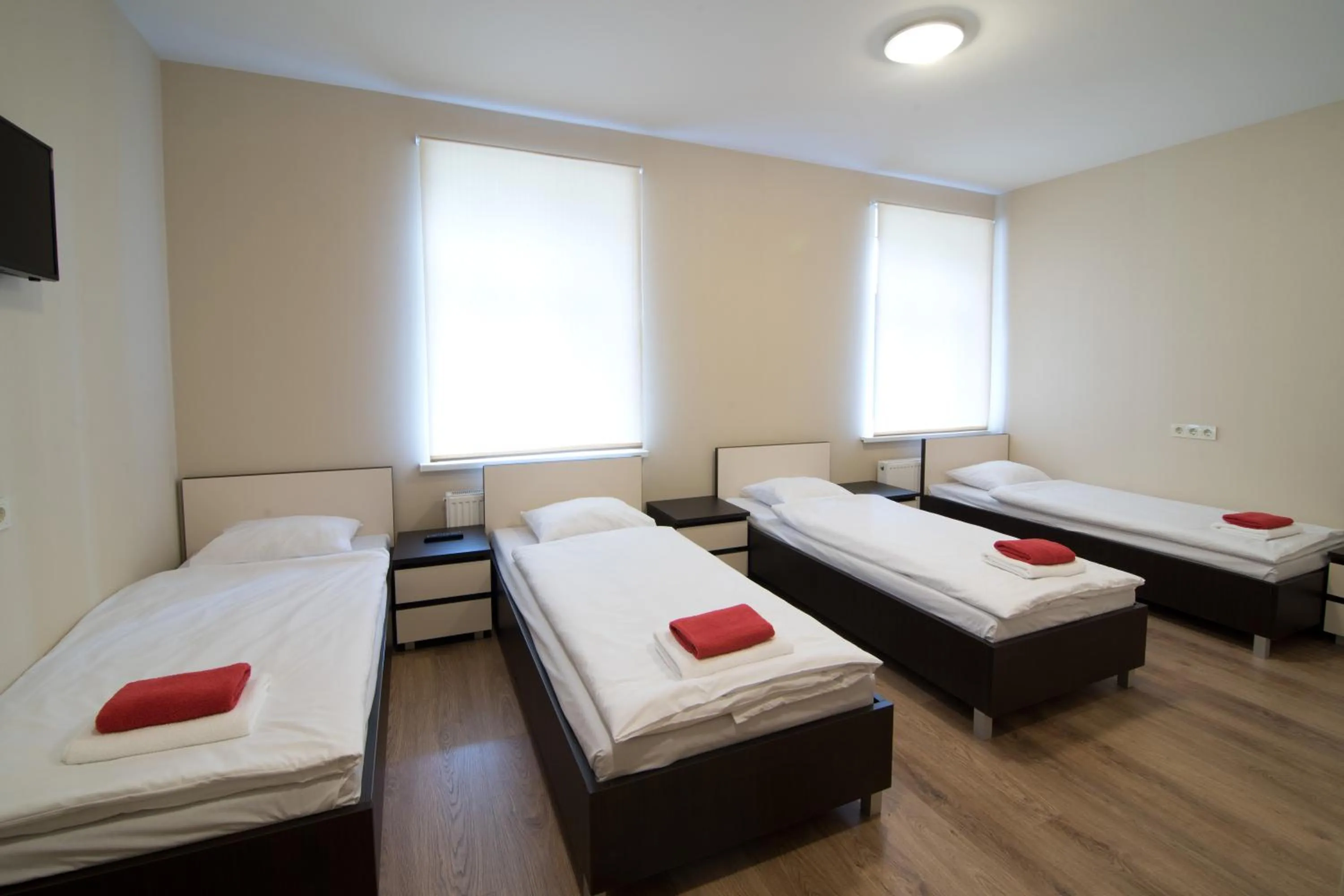 Bed in Bella Riga Hotel with Self-Check in