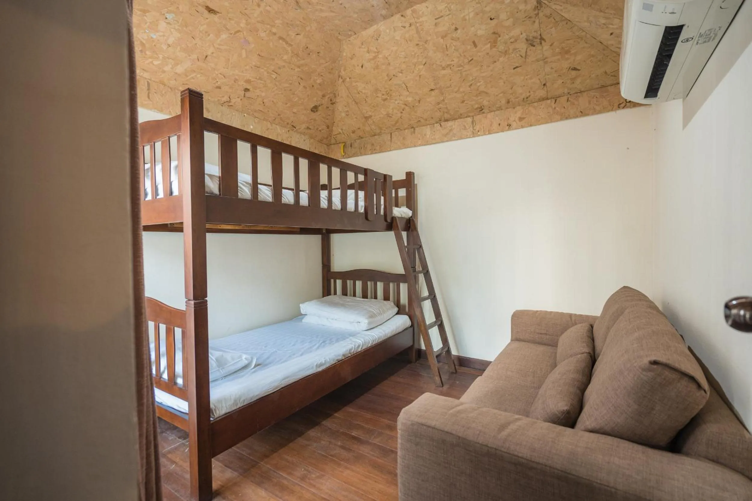 Bed in Yi's Garden Villa