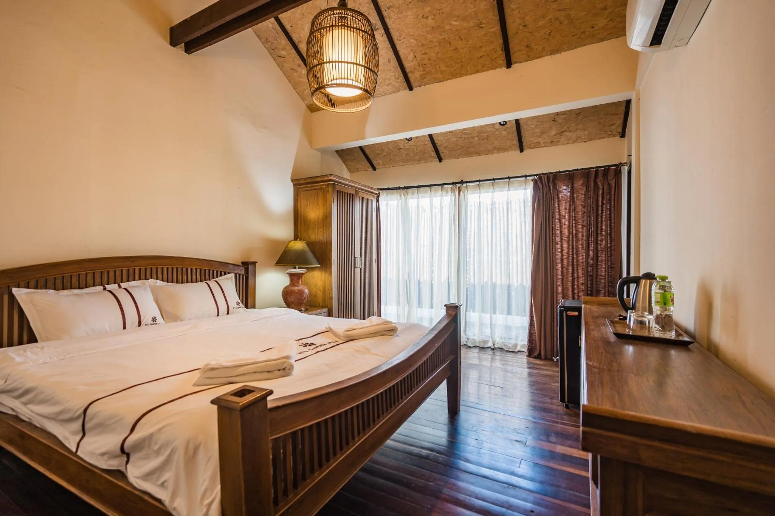 Bed in Yi's Garden Villa