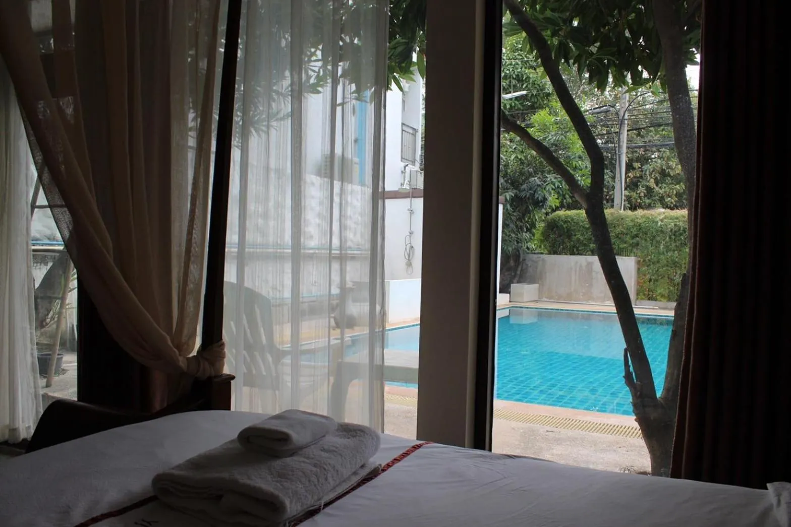 Bed in Yi's Garden Villa