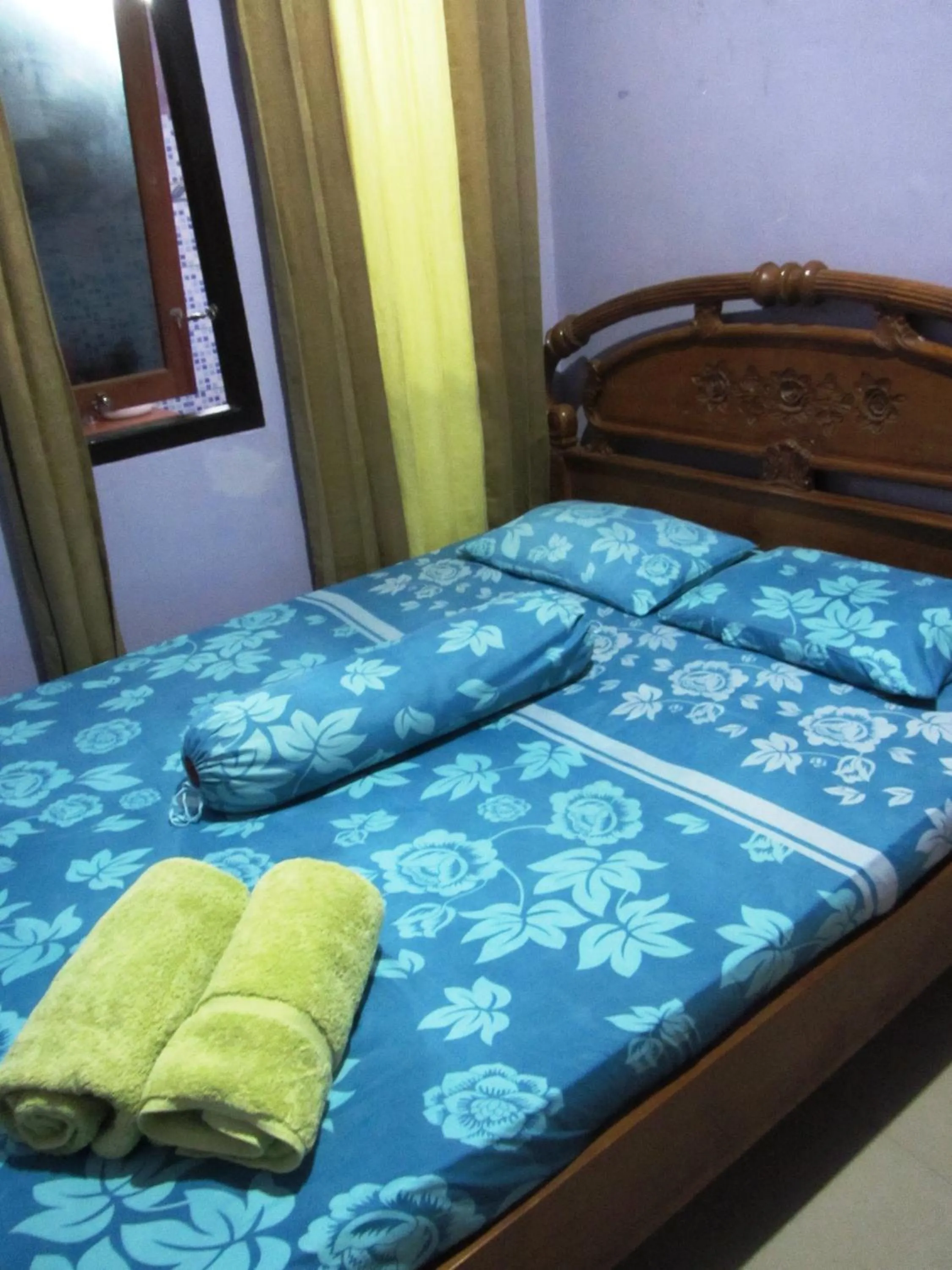 Bed in Kurnia Homestay