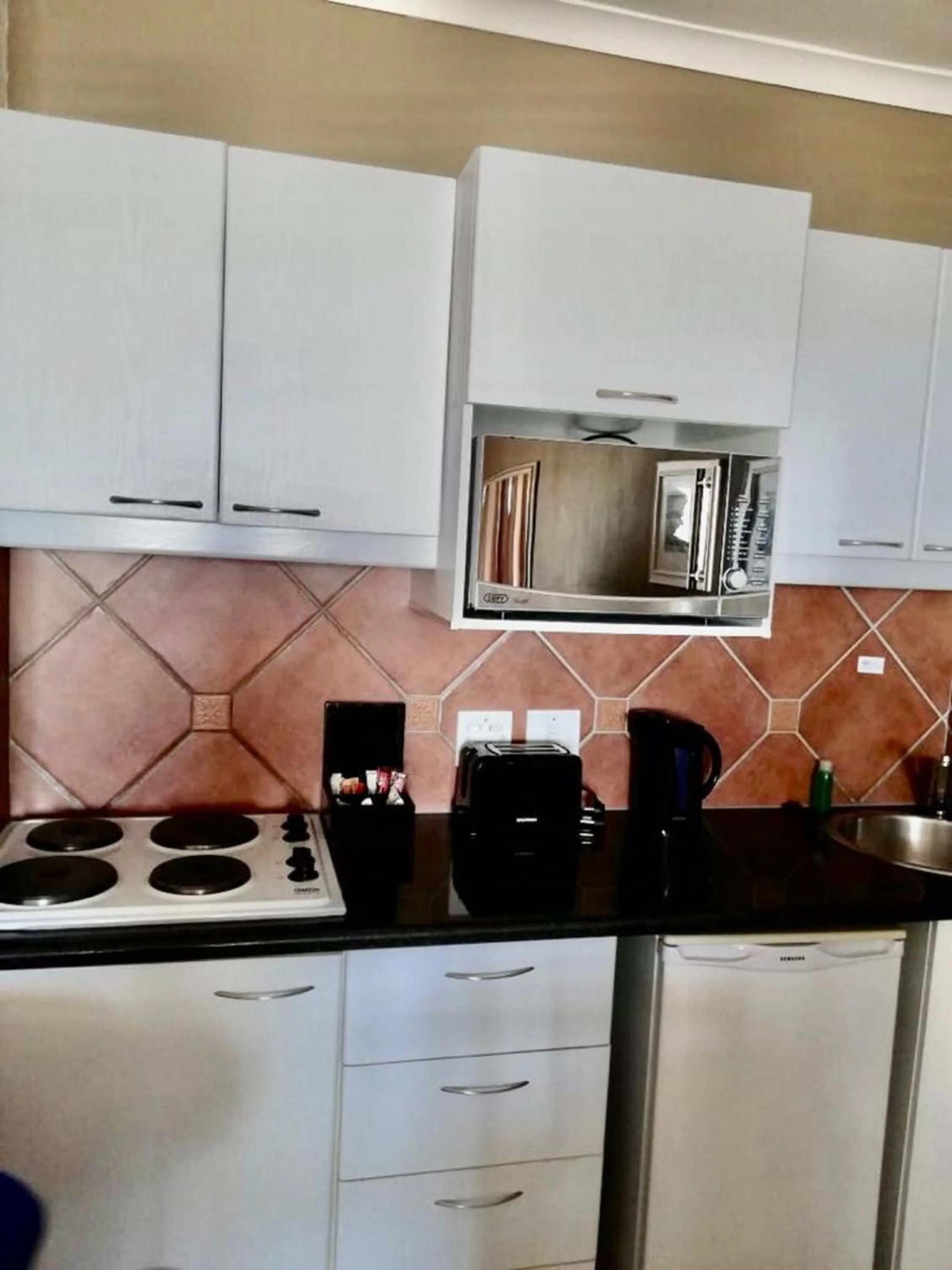 Kitchen or kitchenette in Cape Town Beachfront Apartments at Leisure Bay
