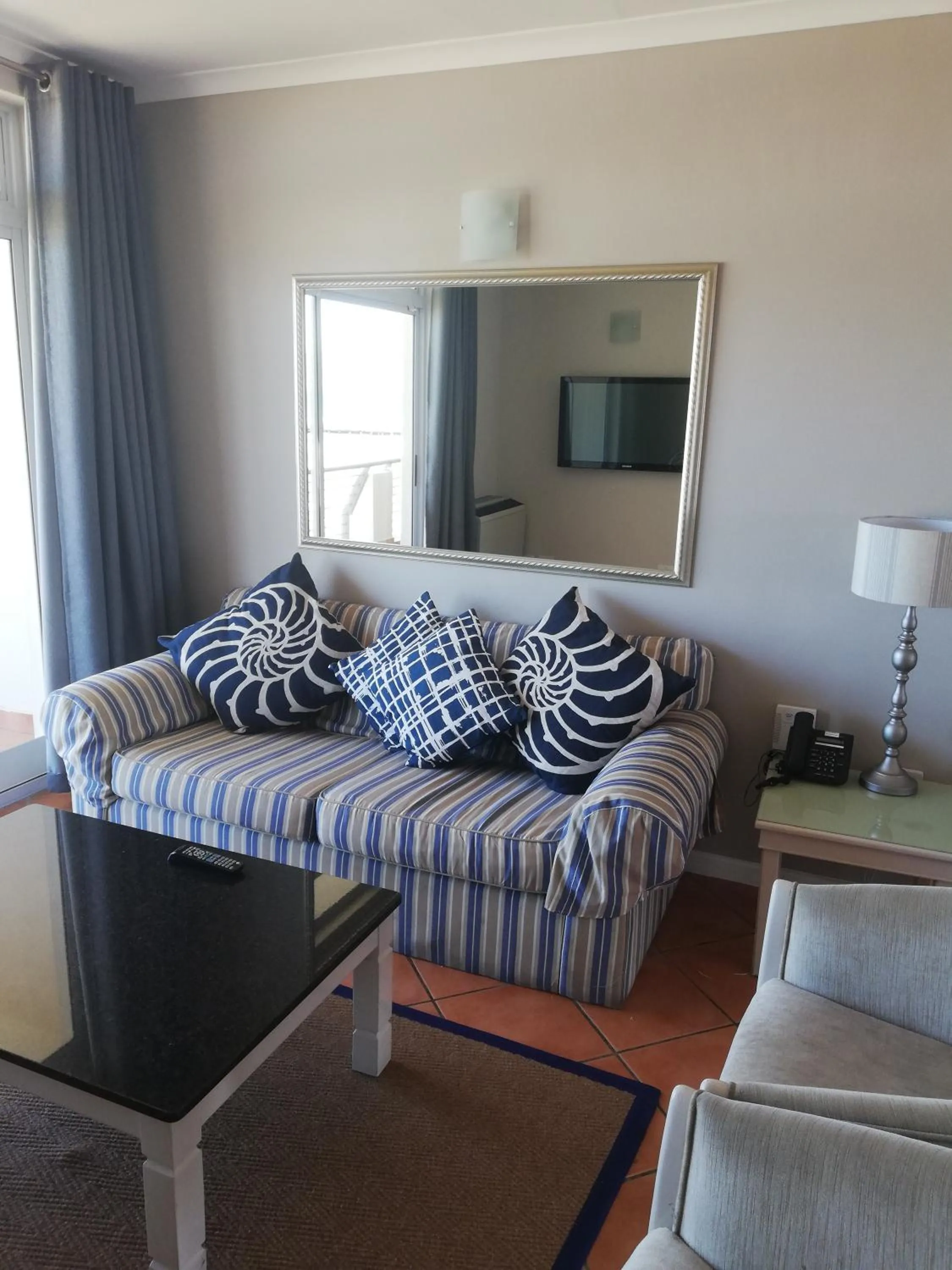 Living room, Bed in Cape Town Beachfront Apartments at Leisure Bay
