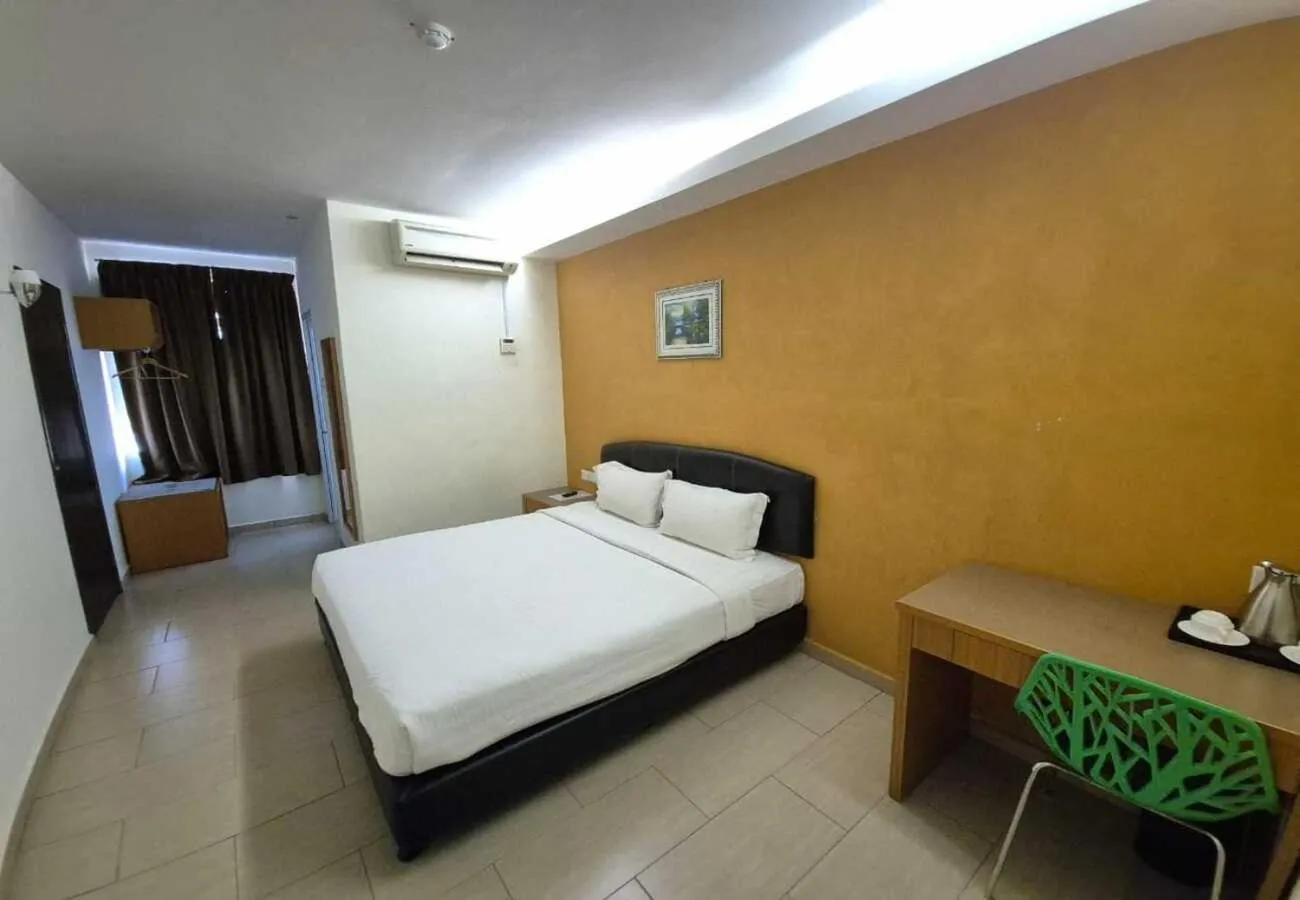 Bed in Hotel Grand Court Inn