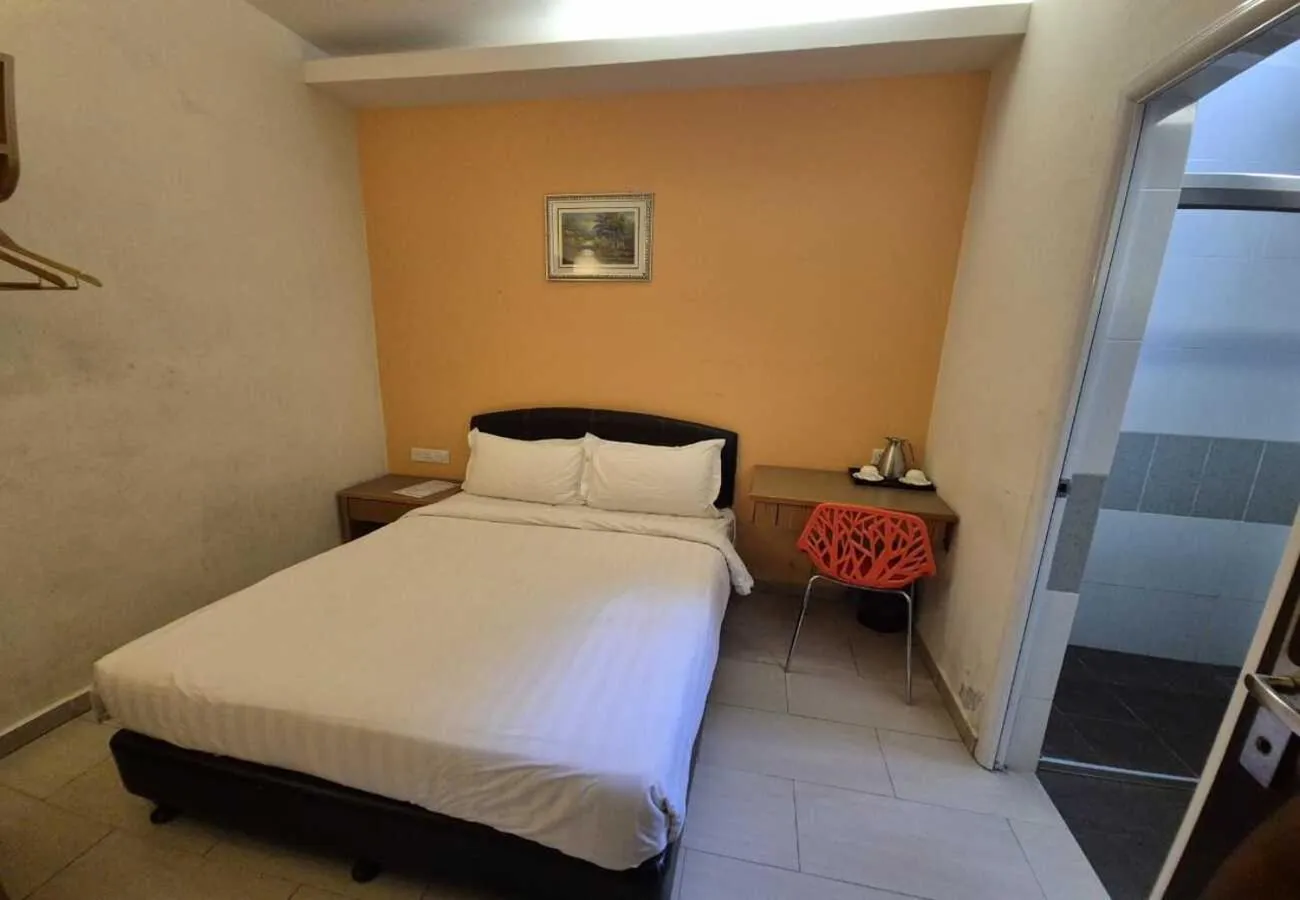 Bed in Hotel Grand Court Inn