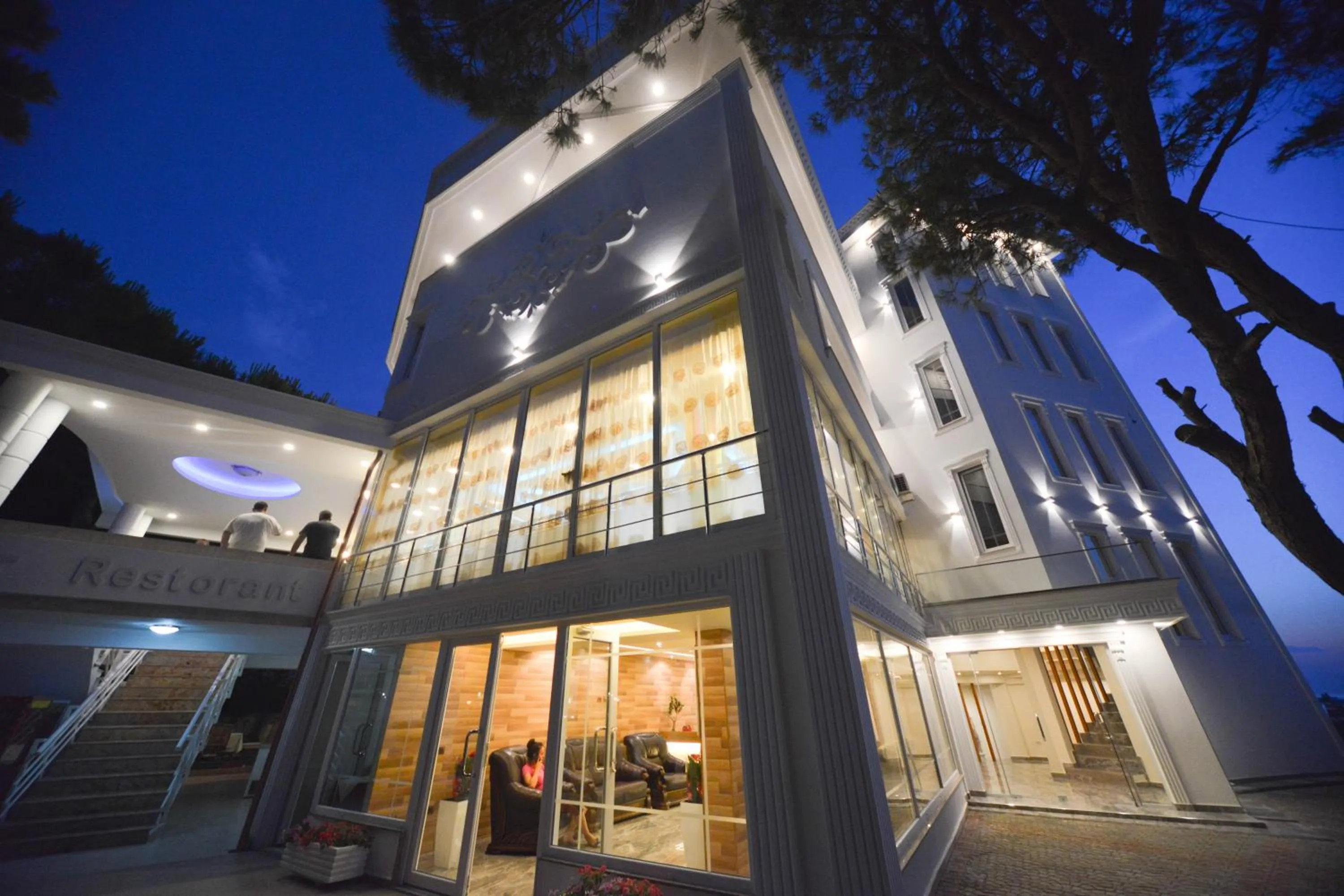 Property logo or sign in Hotel Elesio