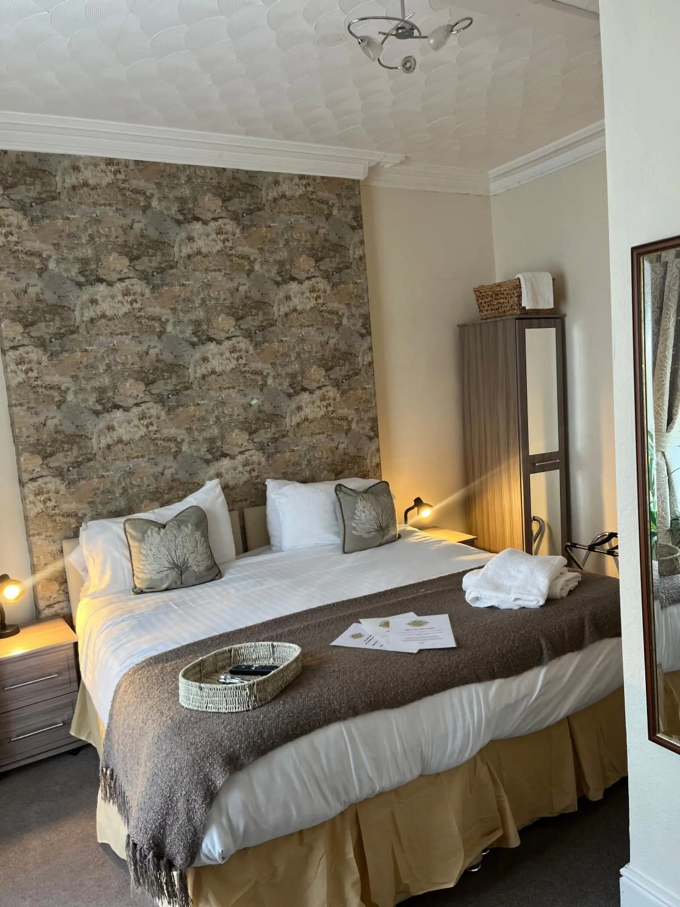 Bed in Johnny Dough's Conwy with Rooms