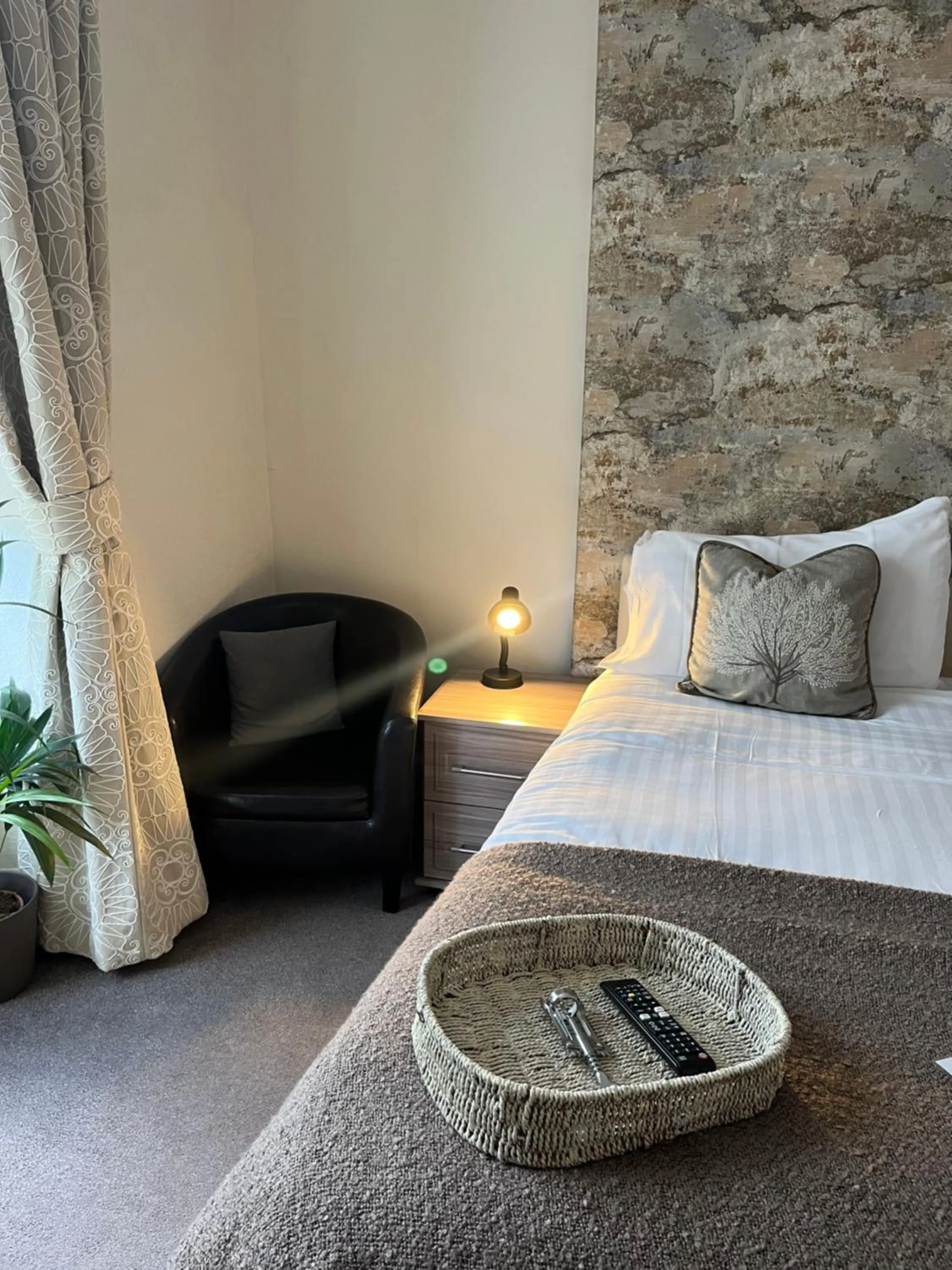 Bed in Johnny Dough's Conwy with Rooms