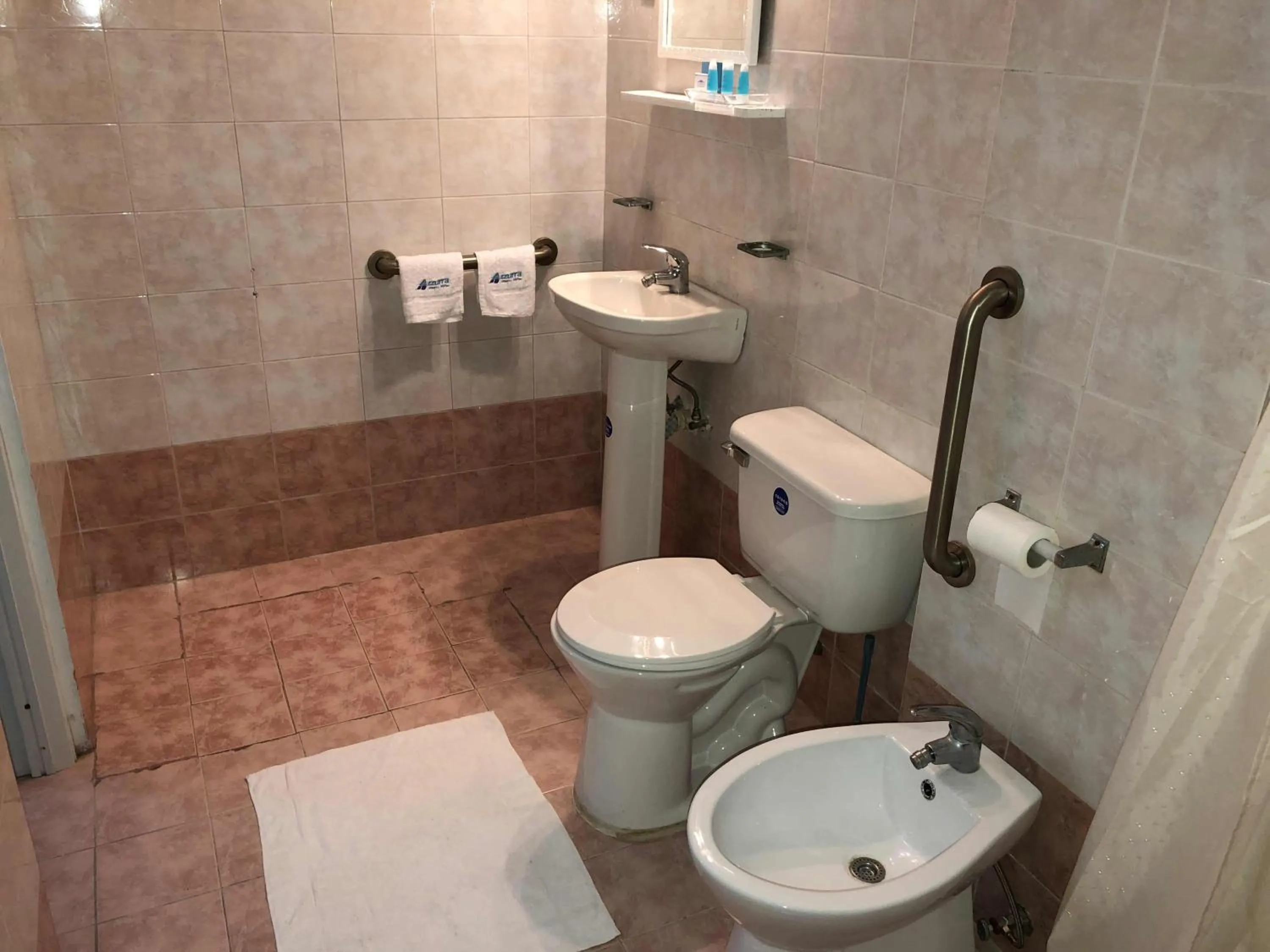 Bathroom in Aparta Hotel Azzurra