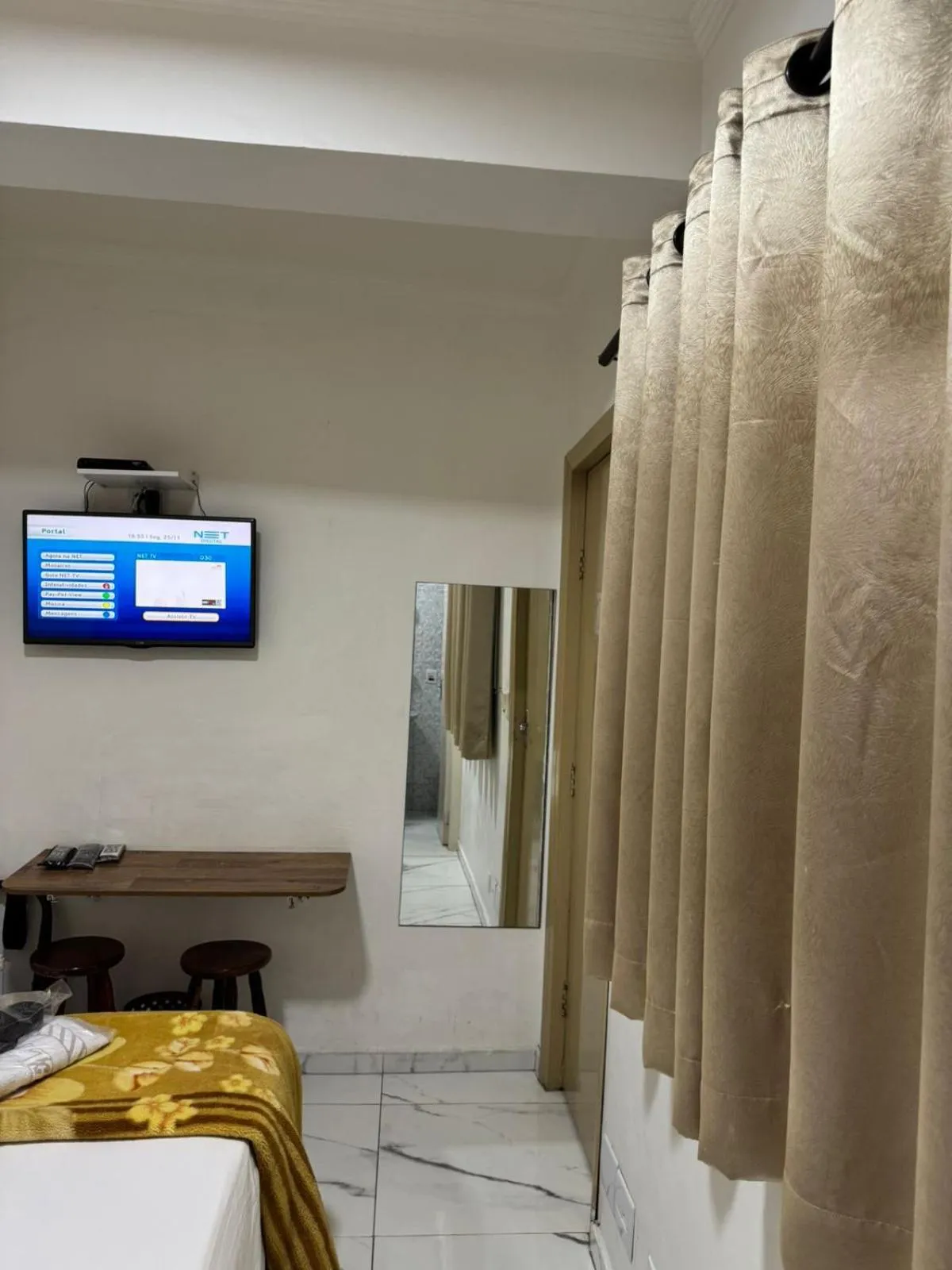 Bed in New Point Hotel