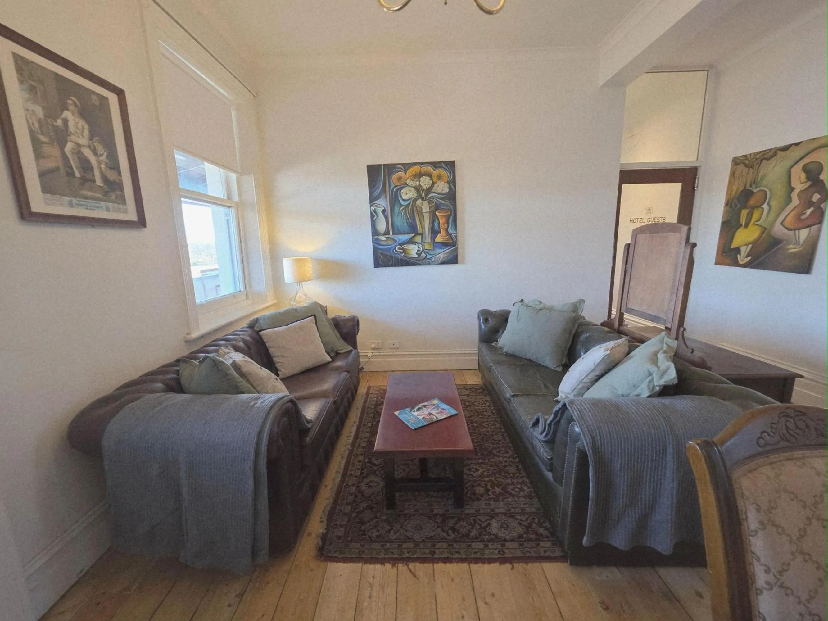 Communal lounge/ TV room in The Corner Hotel Alexandra