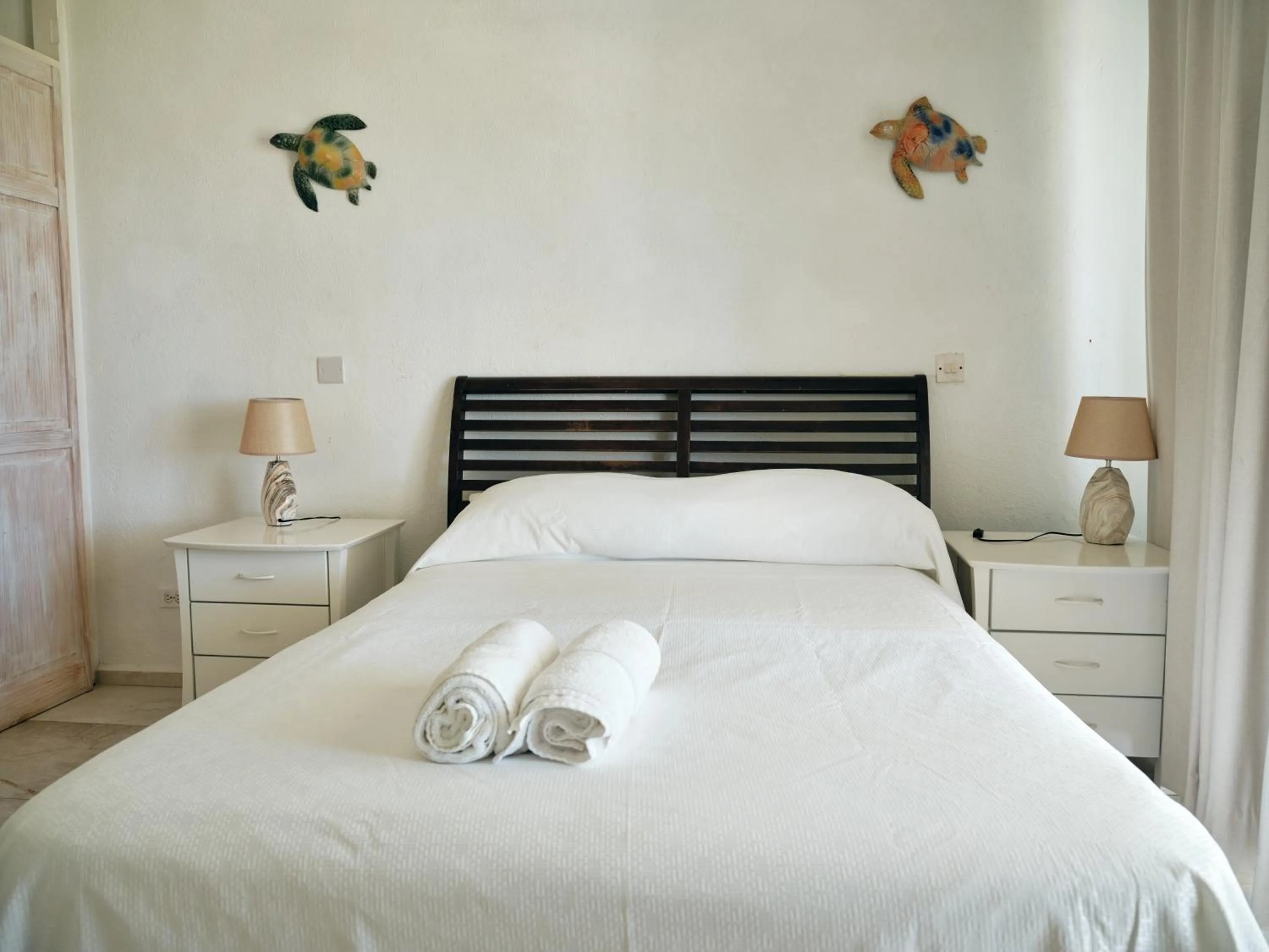 Bed in Ocean Spray Apartments