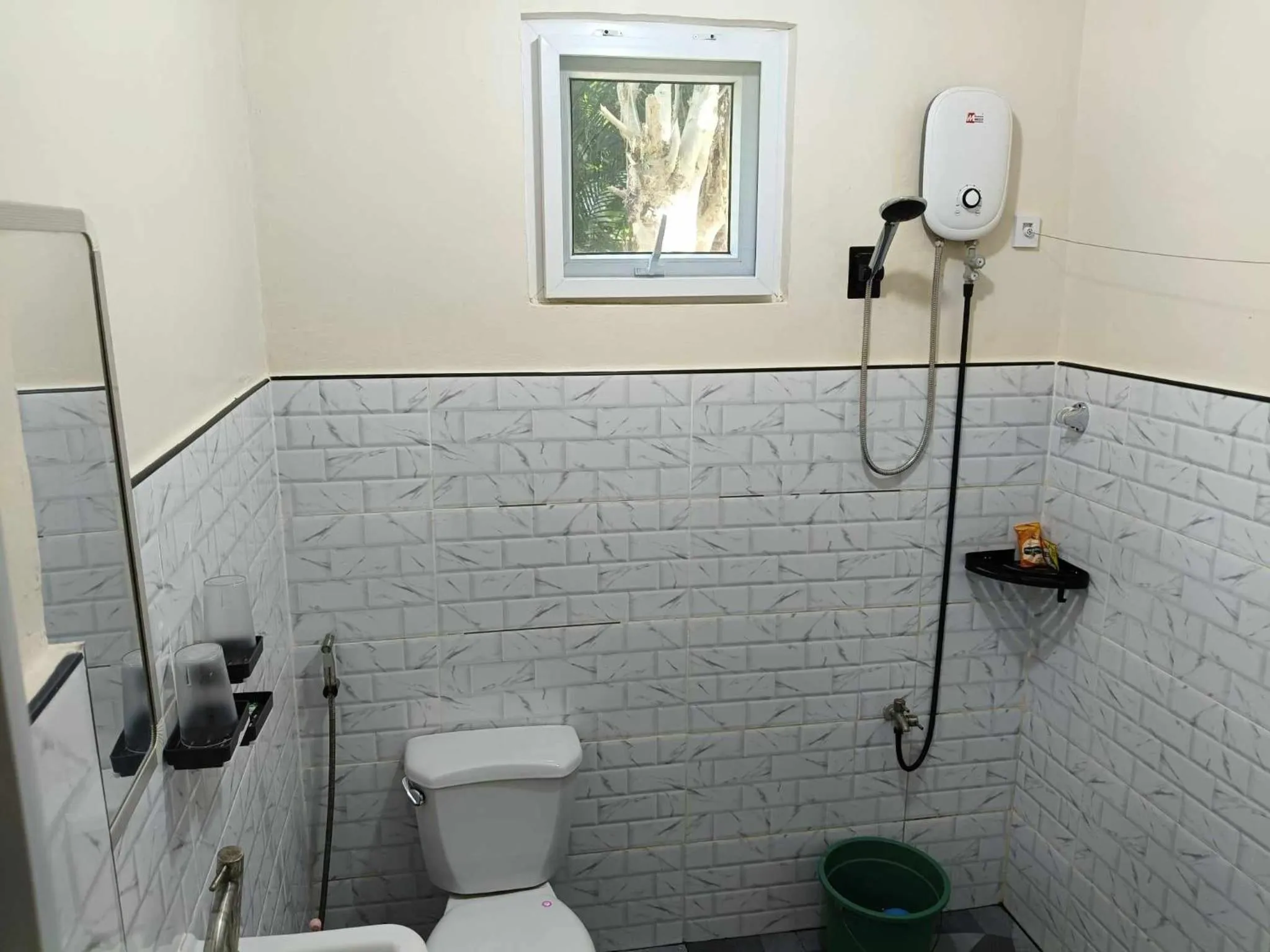 Shower in Whitesands Beach Resort