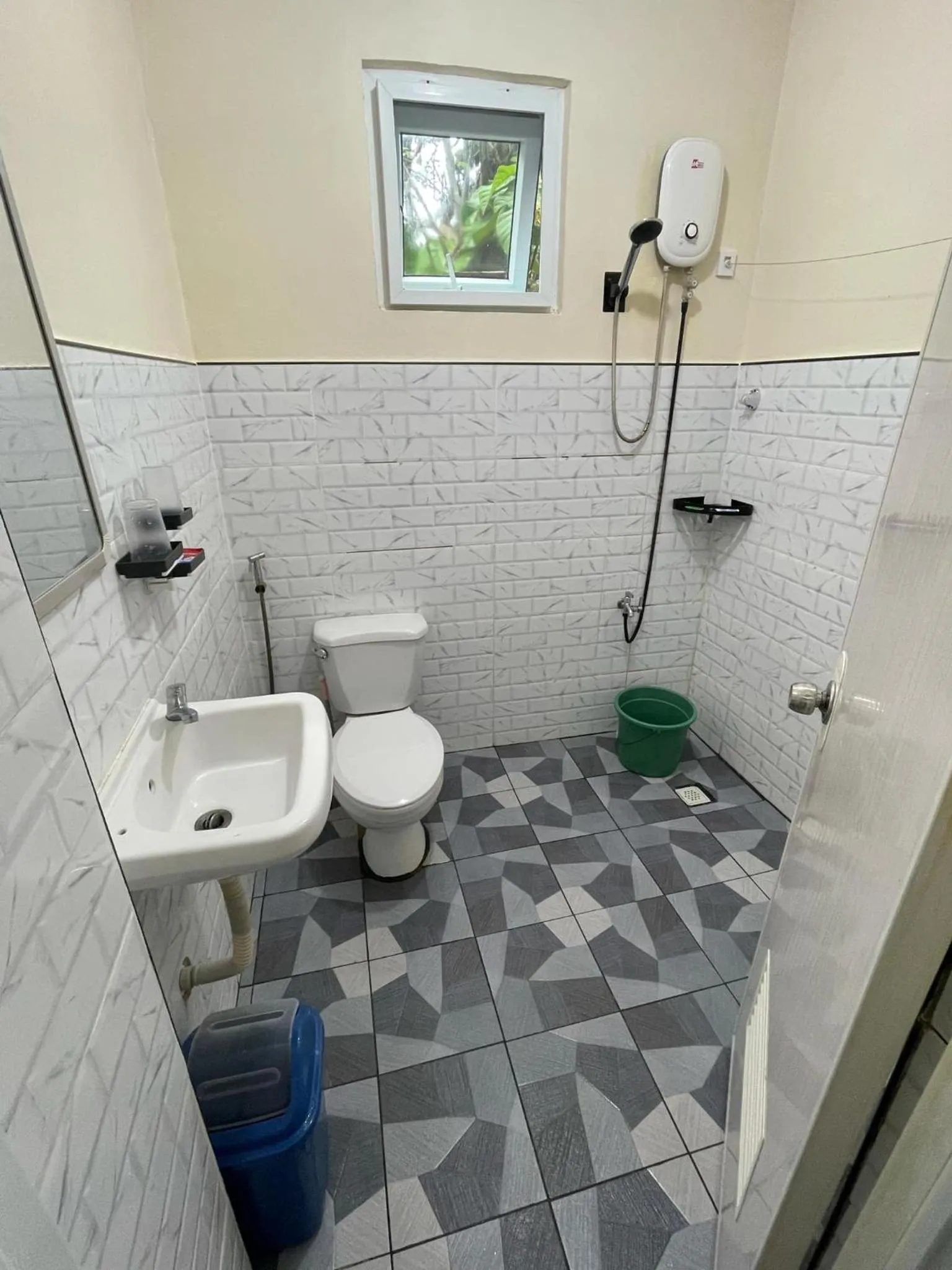 Shower in Whitesands Beach Resort