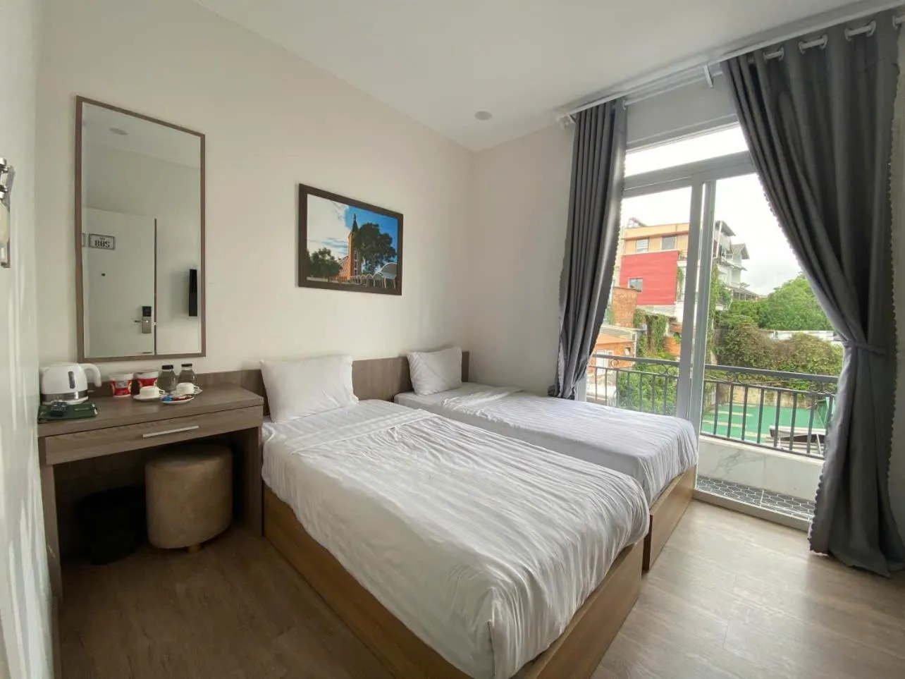 Bed in Ami Hotel Dalat