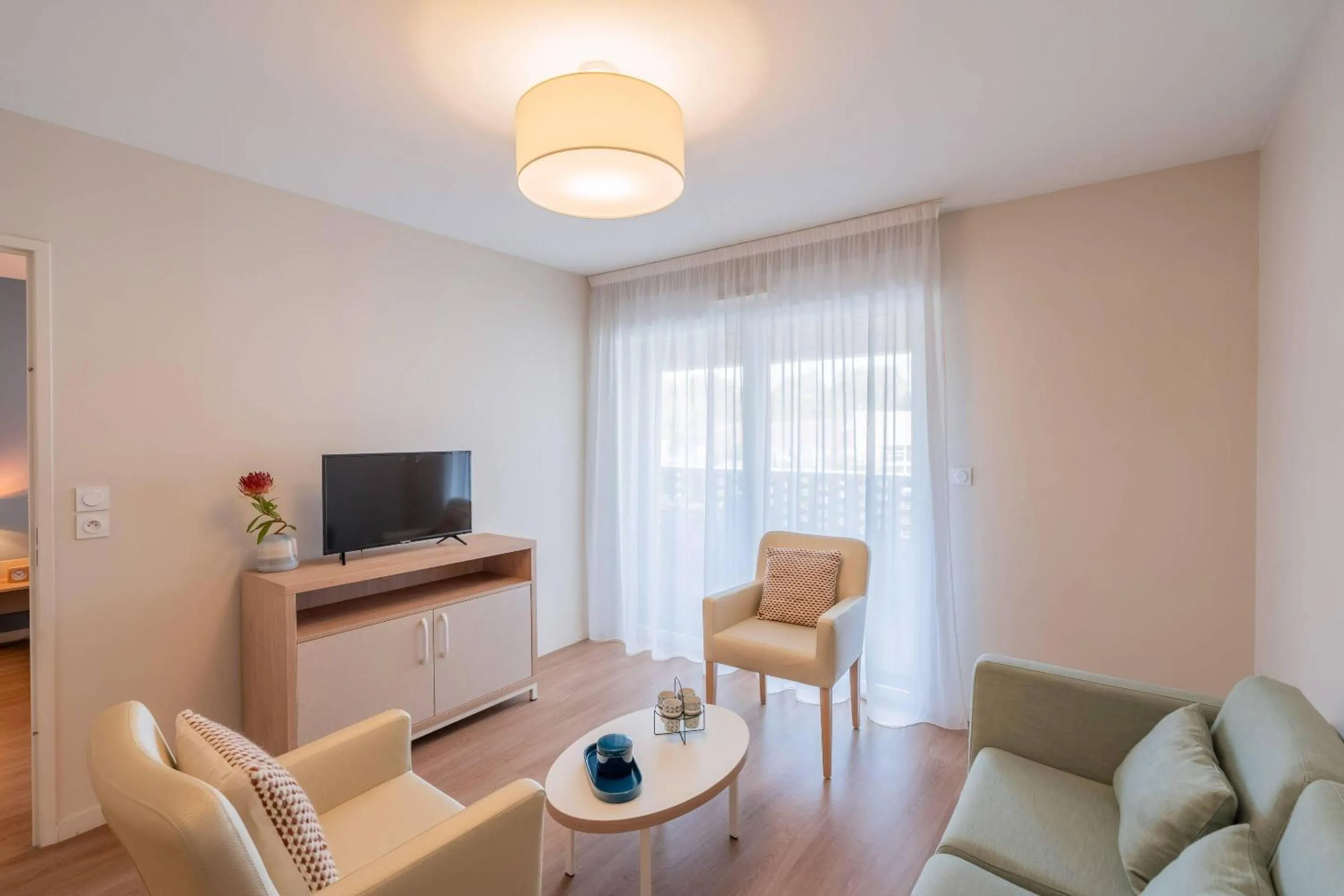 Living room in Quality Aparthotel Toulouse Ponts Jumeaux