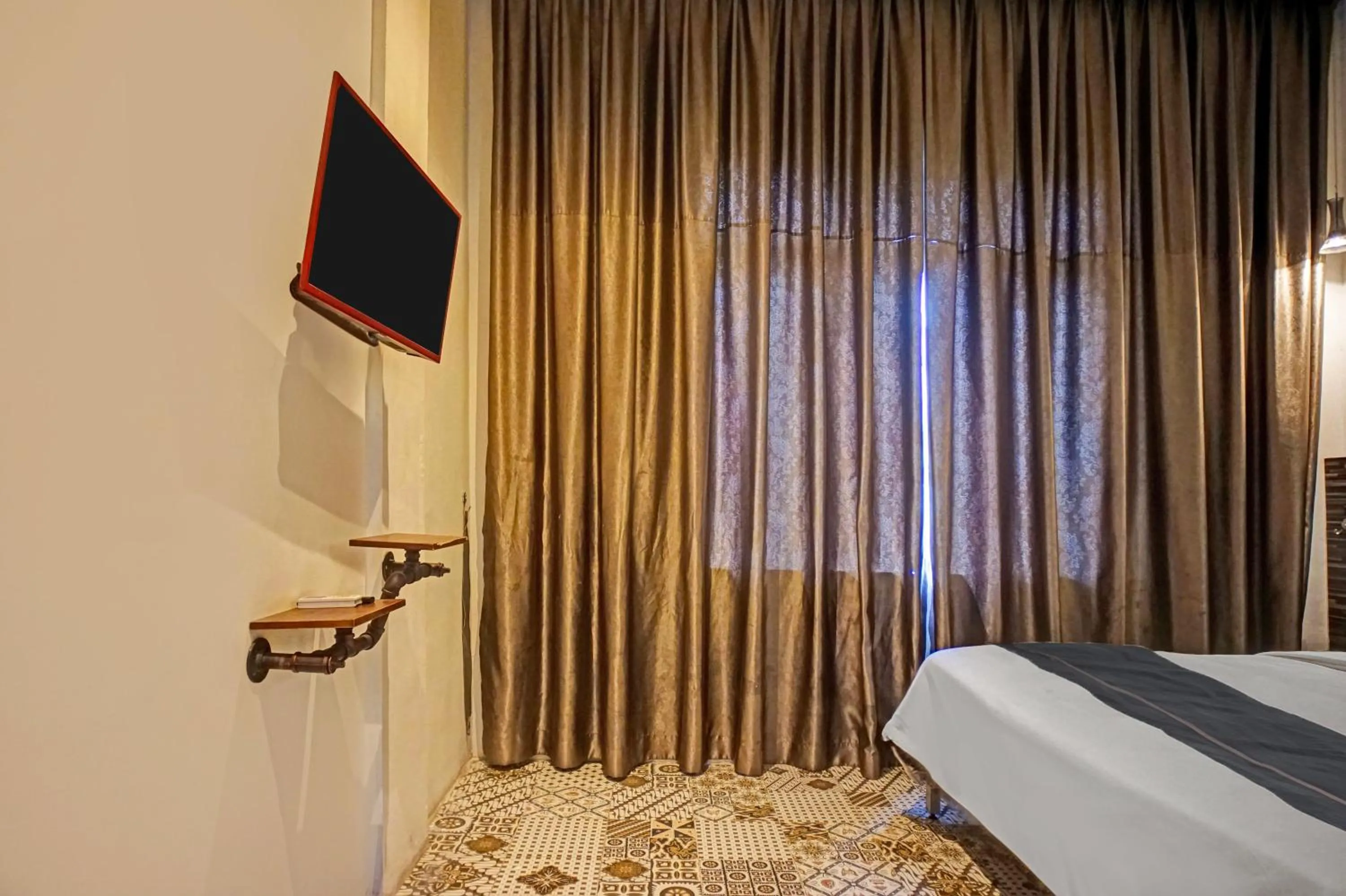 Bedroom, Bed in Hotel O near Ringroad City Walk XXI formerly Mitrotel Medan