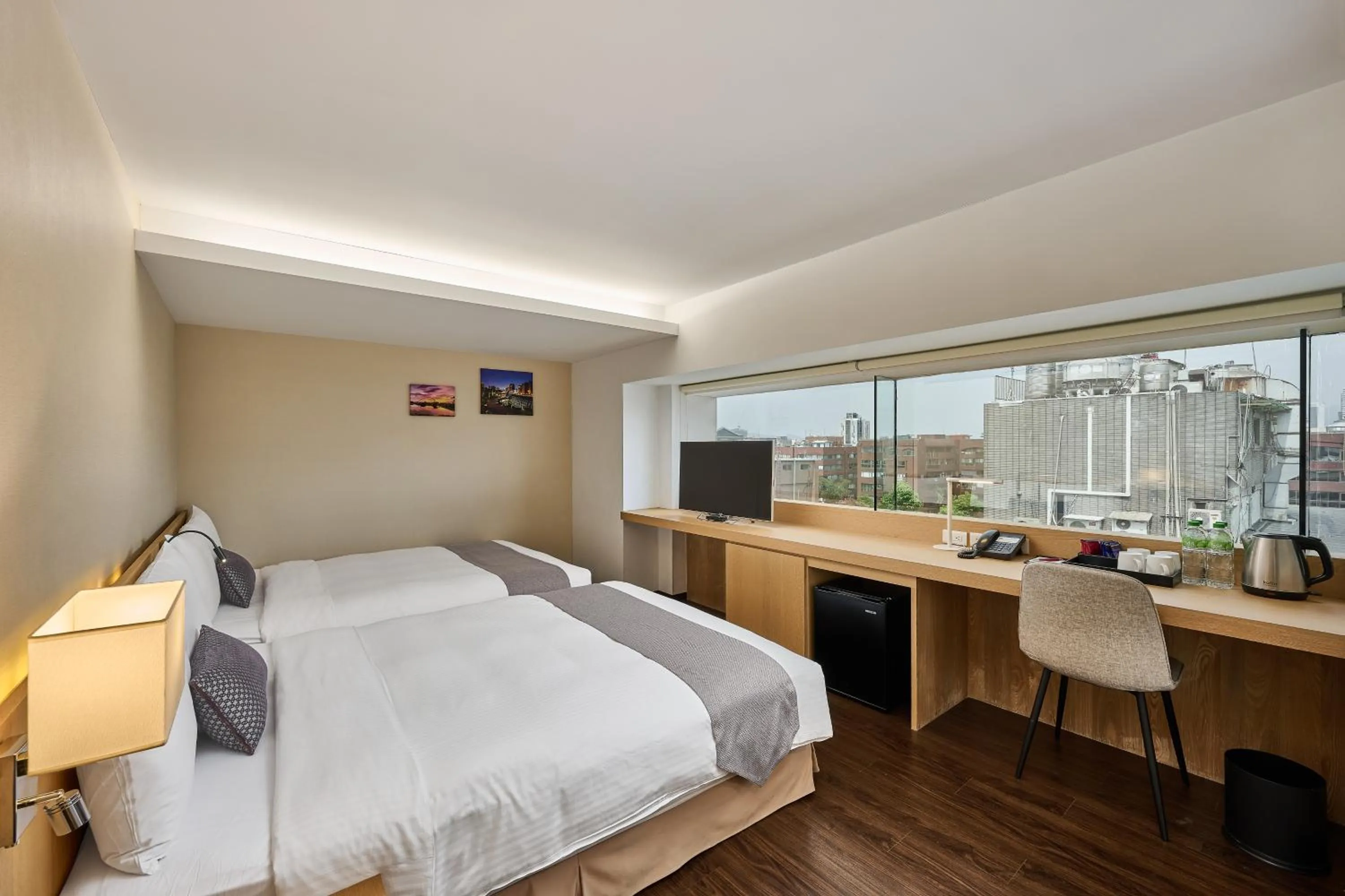 Bed in Eastin Taipei Hotel