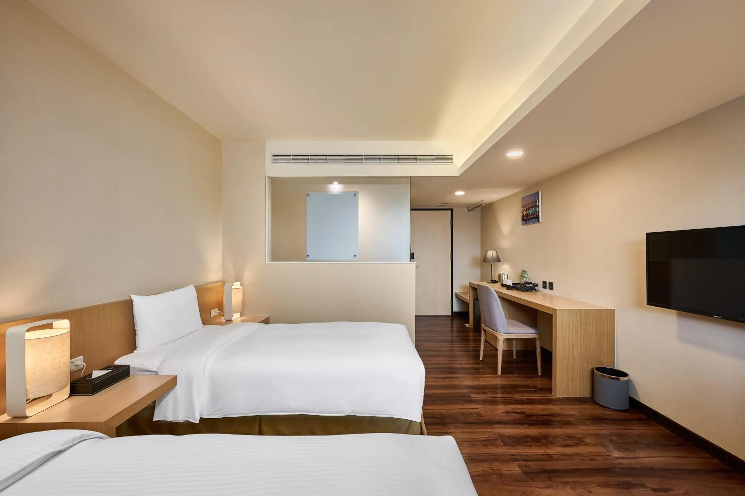 Bed in Eastin Taipei Hotel