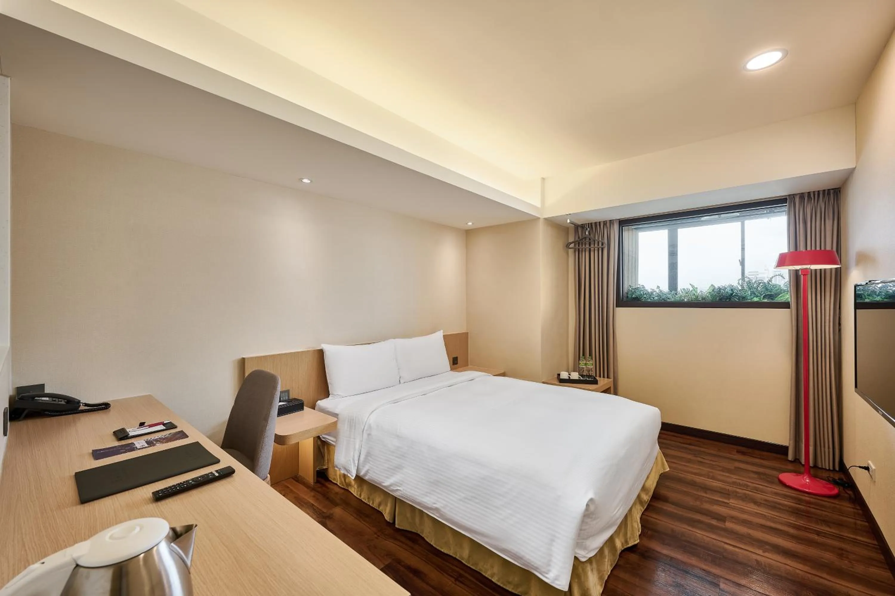 Bed in Eastin Taipei Hotel