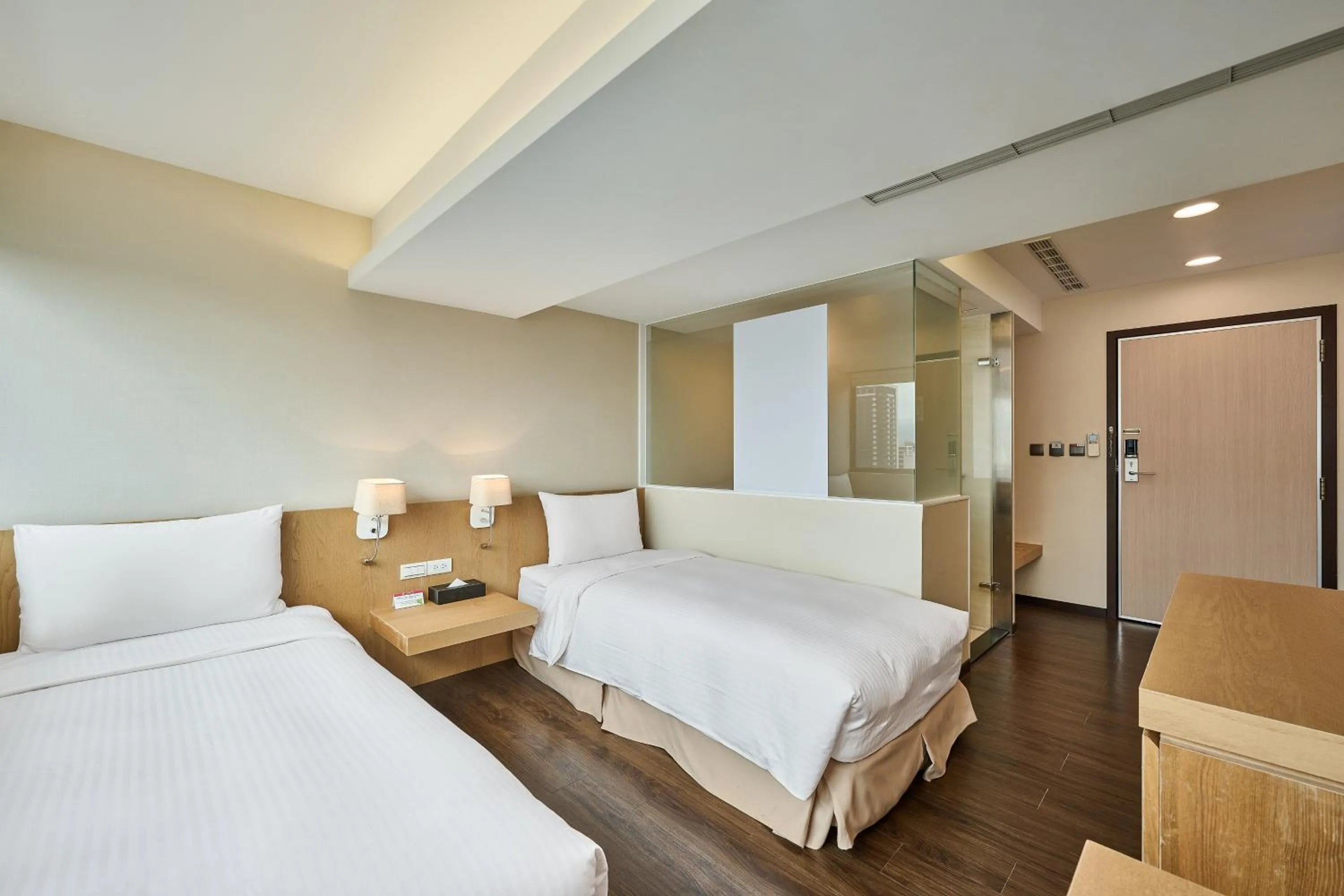 Bed in Eastin Taipei Hotel