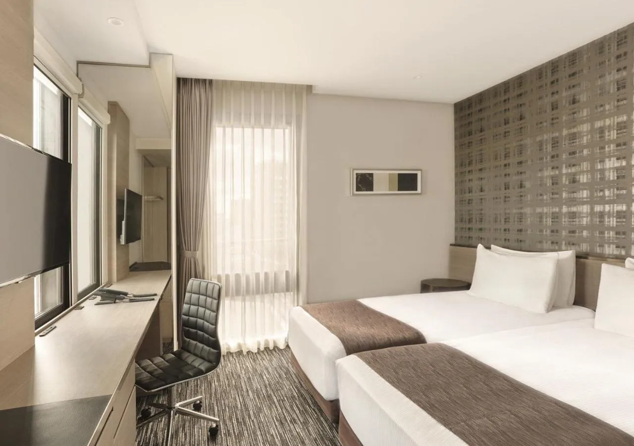 Photo of the whole room, Bed in The Strings Hotel Nagoya