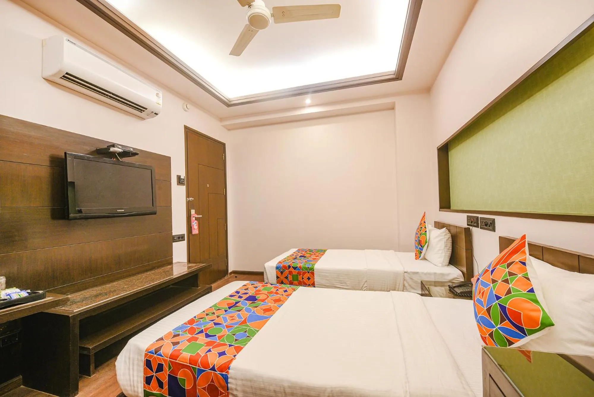 Bed in FabHotel Aashraye
