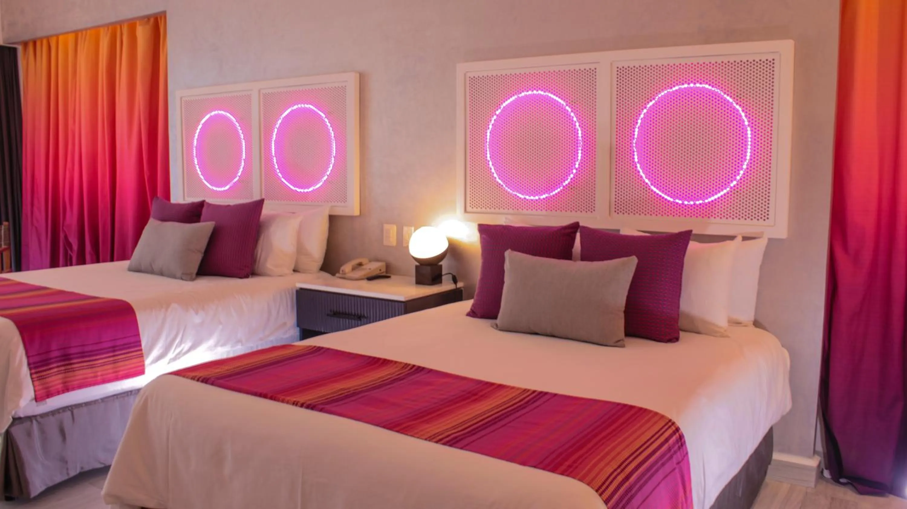 Bed in Almar LGBT Luxury Resort