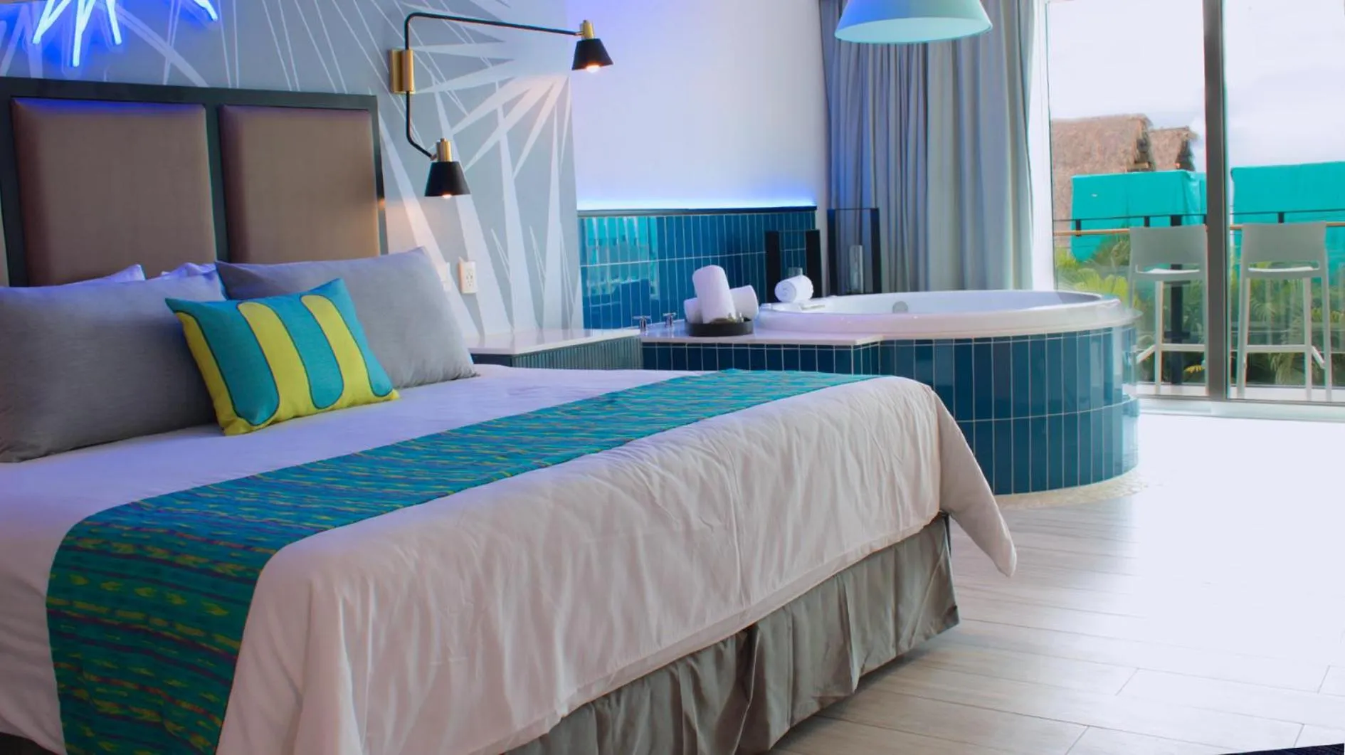 Bed in Almar LGBT Luxury Resort