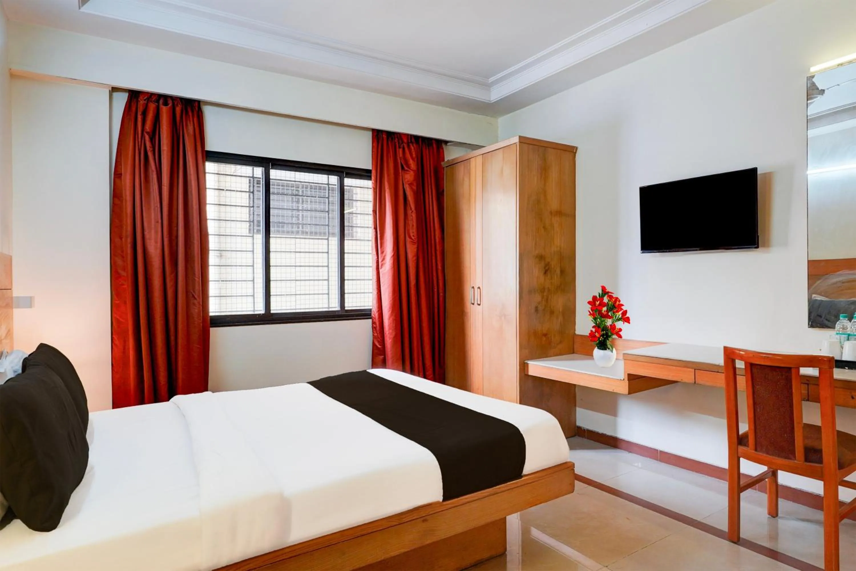 Bedroom, Bed in Super Hotel O Thimmaiah Rd Rajajinagar