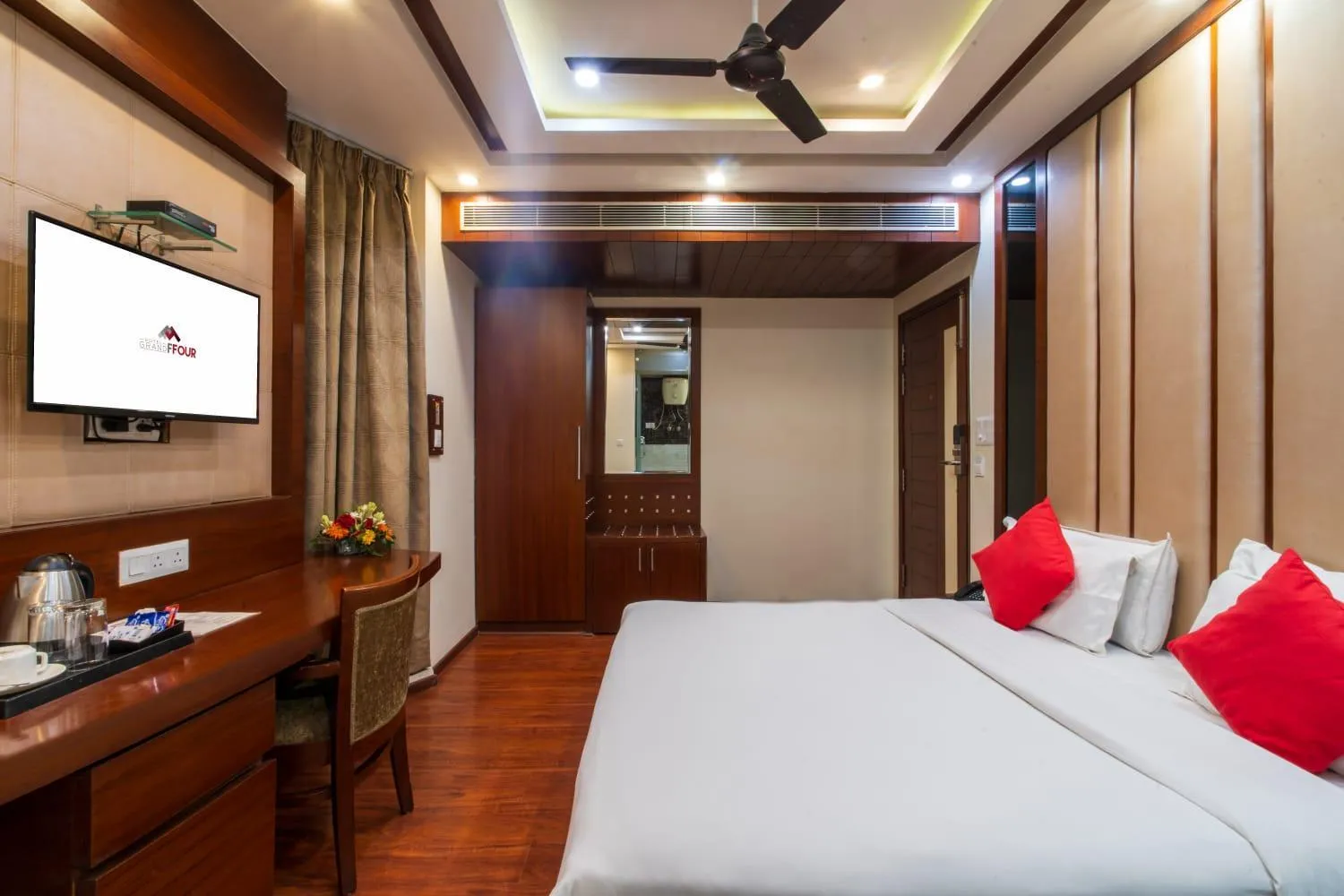 Photo of the whole room, Bed in Grand FFOUR near Nehru Place, Delhi