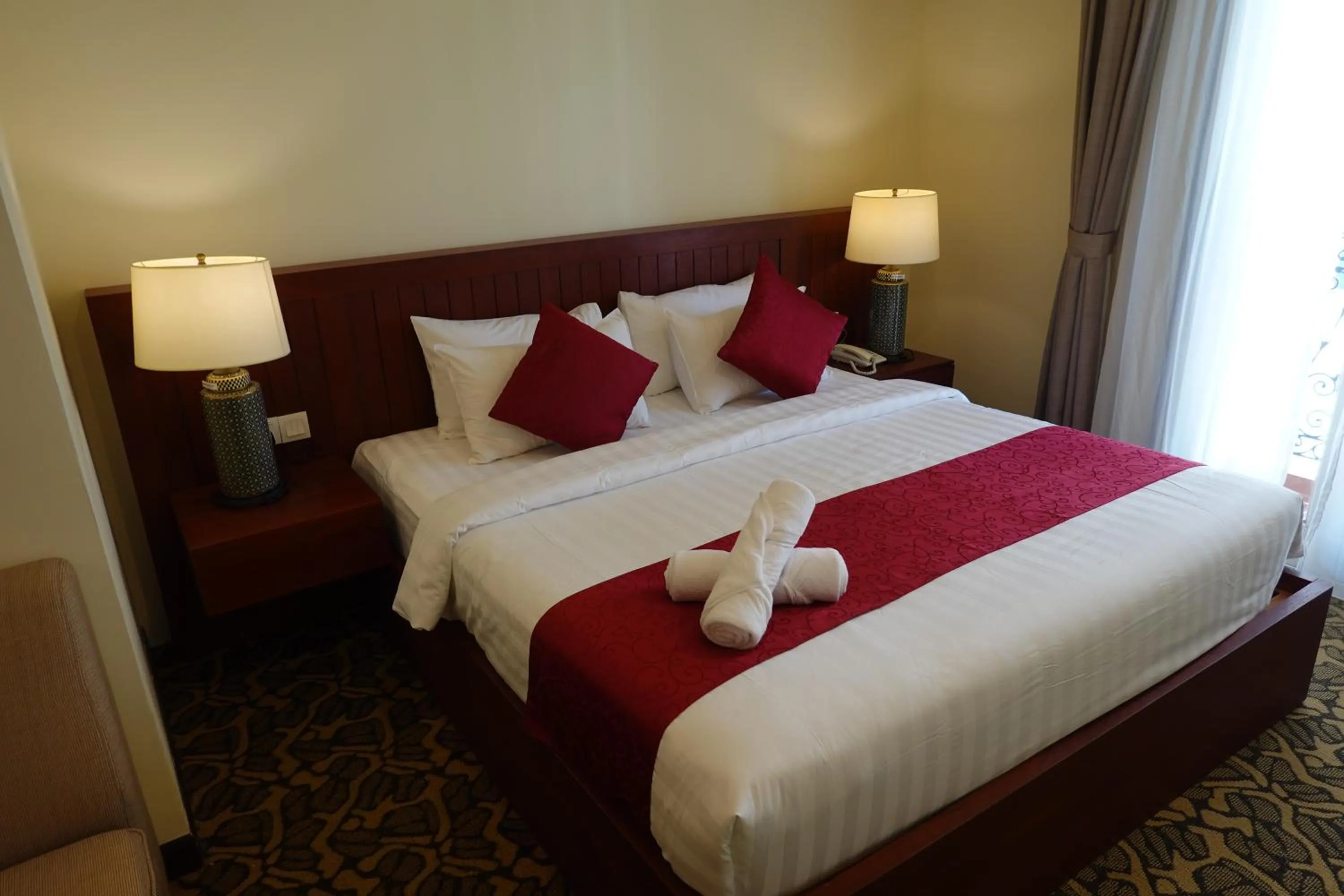 Bed in MM Heritage Hotel