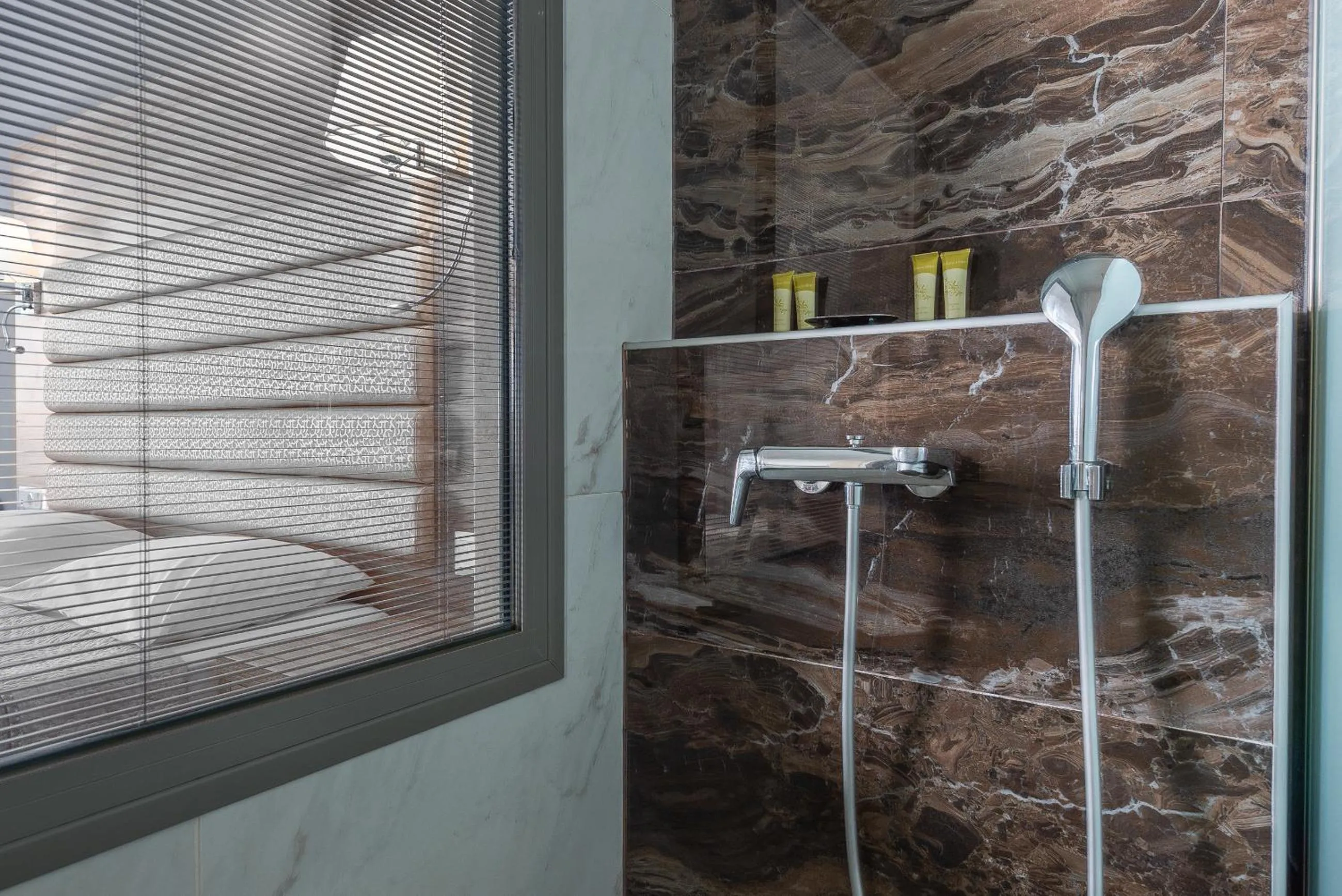 Shower in Dionysos Hotel & Suites