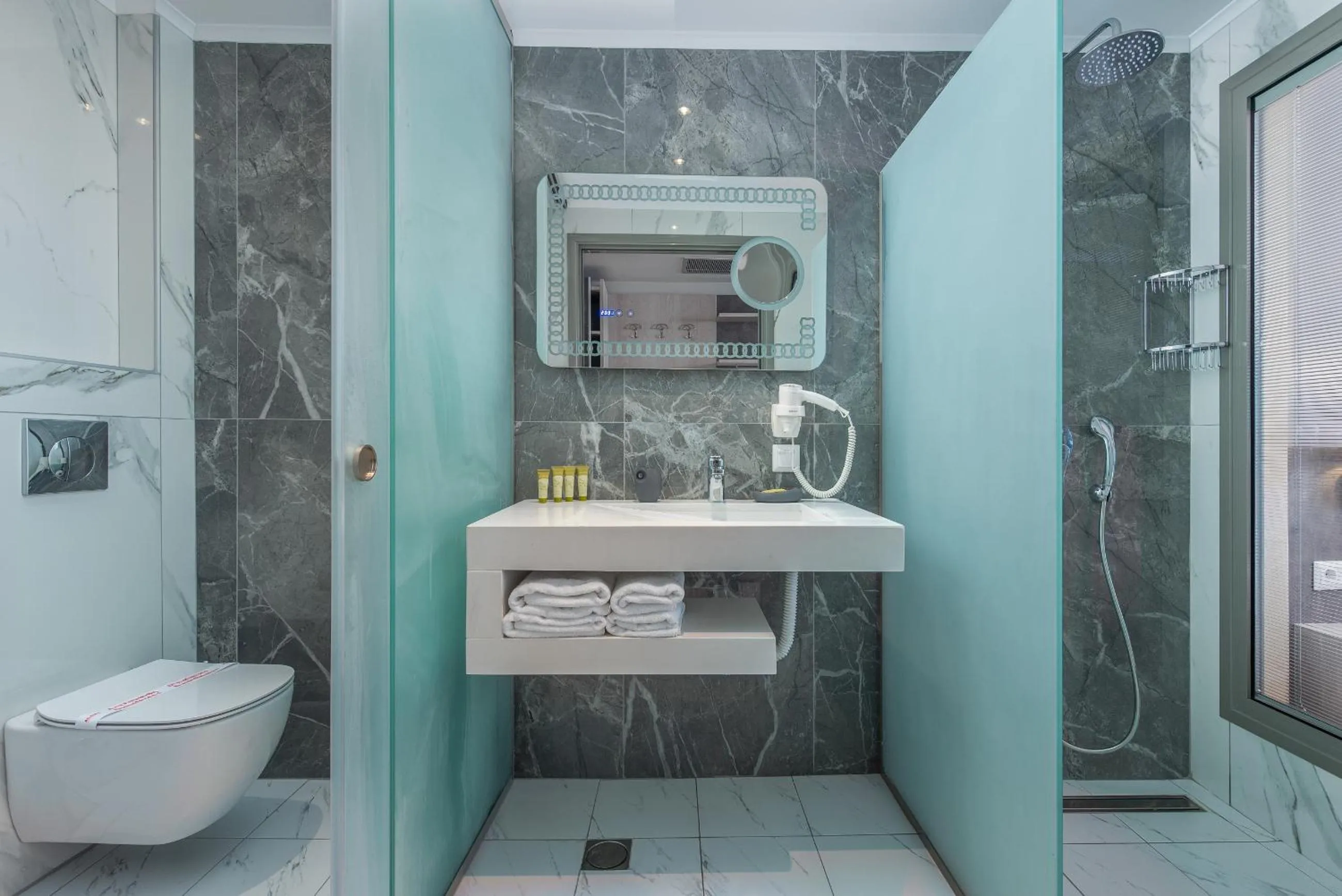 Shower in Dionysos Hotel & Suites