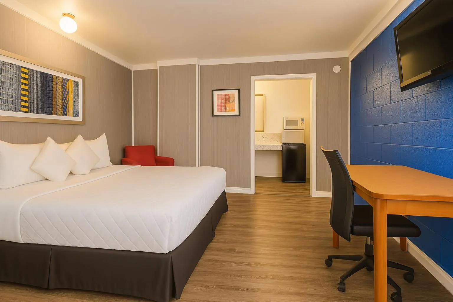 Bed in Sawmill Lodges Motel