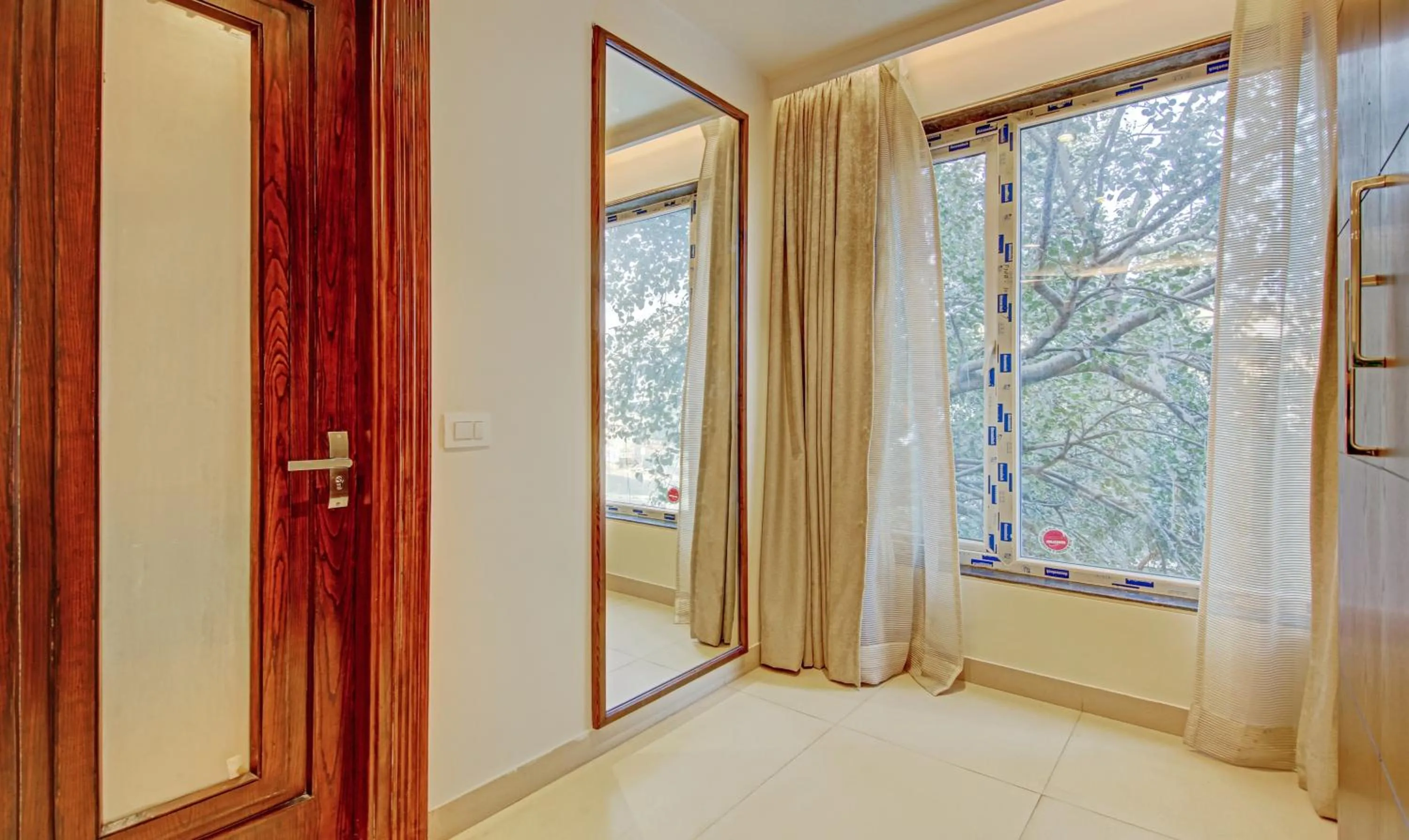 Bedroom in Treebo Premium Relax Inn Patel Nagar