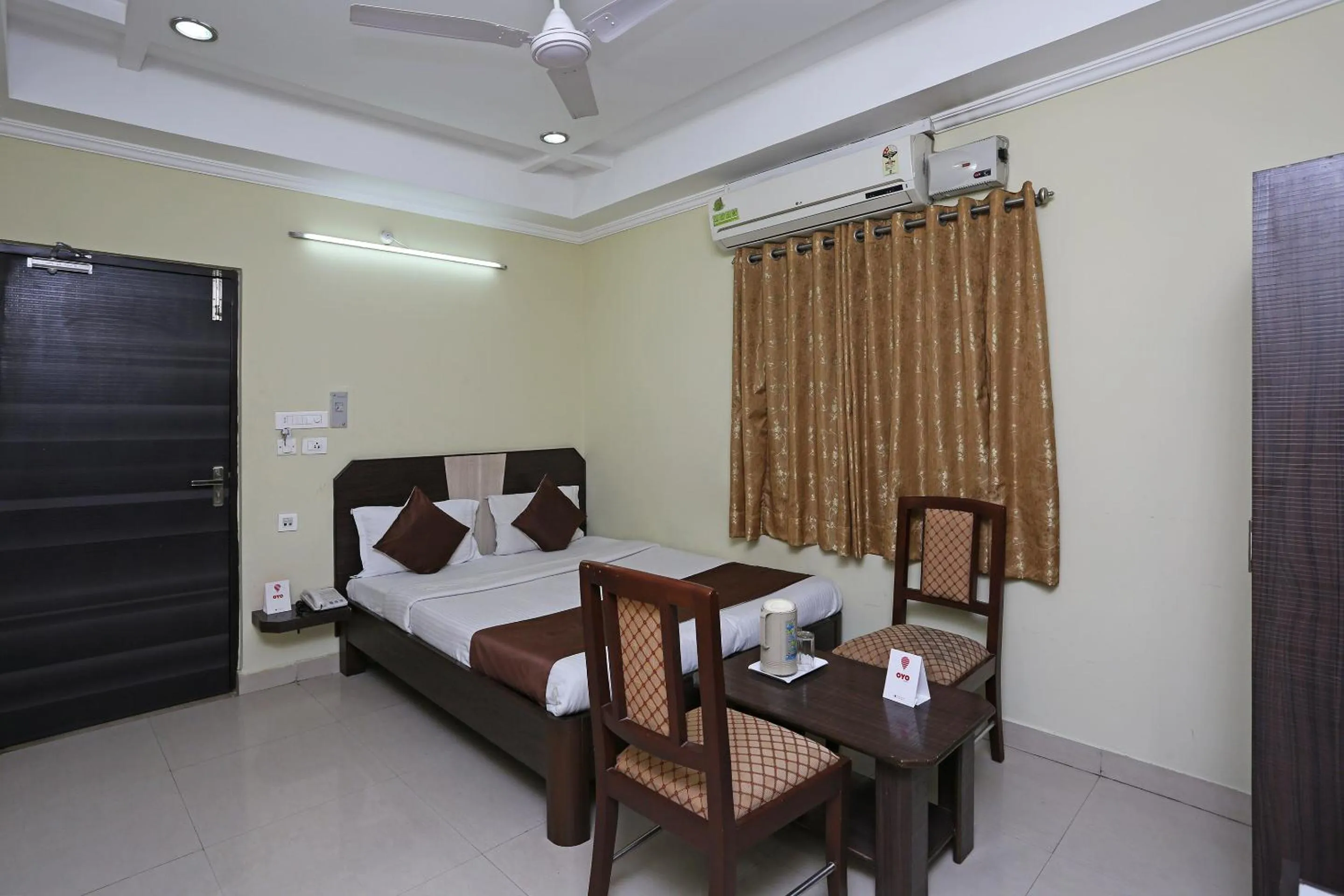 Bedroom, Bed in Hotel O Saraswathi Residency Near SR Nagar Metro Station