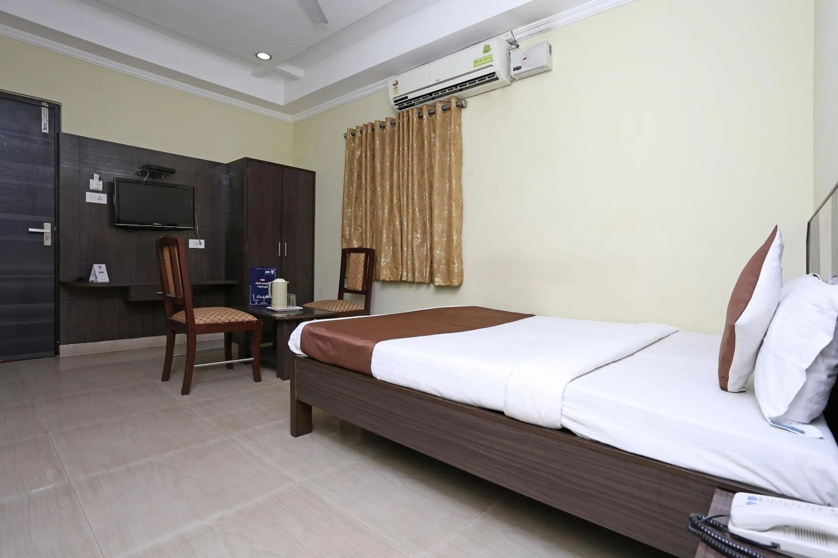 Bedroom, Bed in Hotel O Saraswathi Residency Near SR Nagar Metro Station
