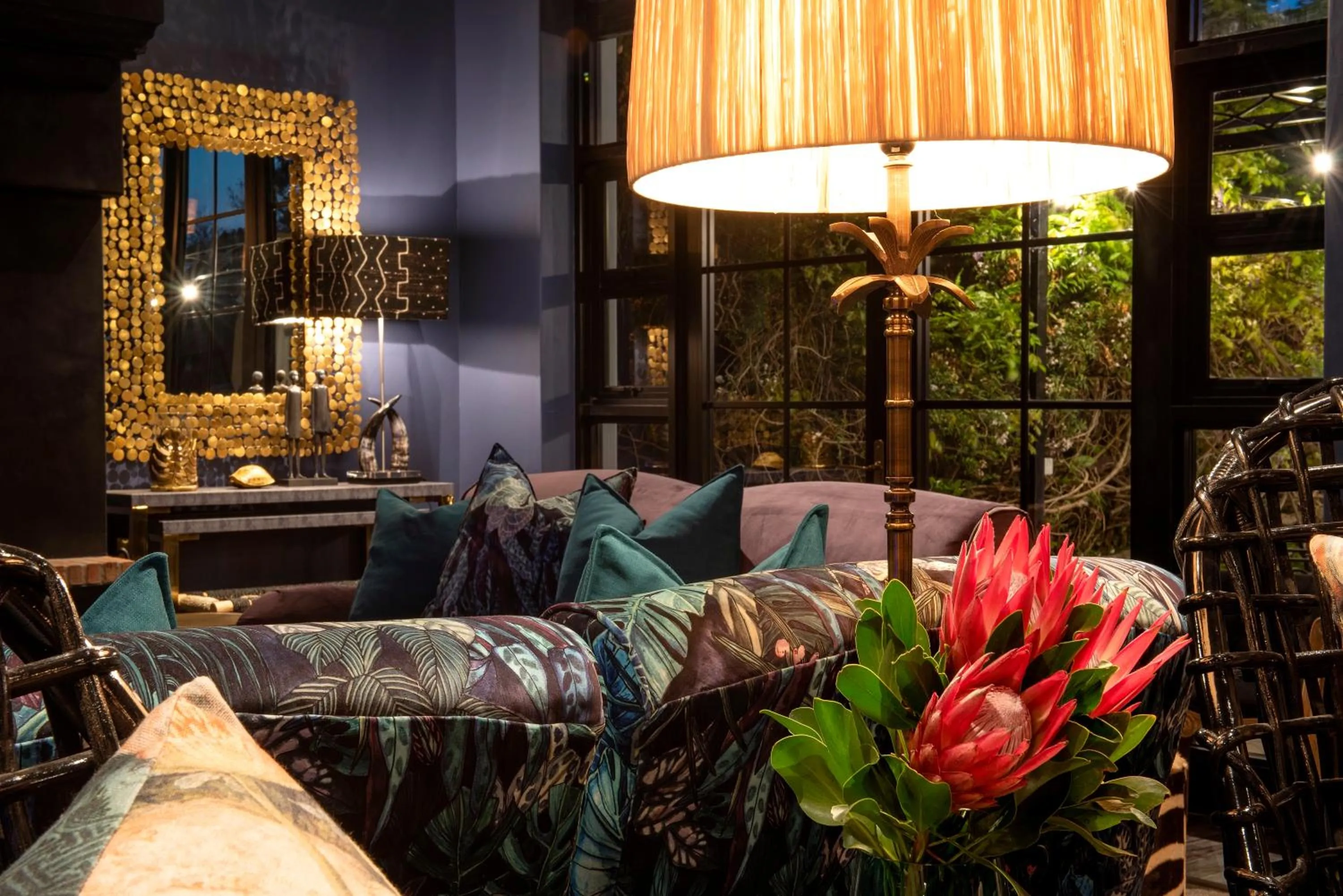 Communal lounge/ TV room in La Fontaine Boutique Hotel by The Oyster Collection