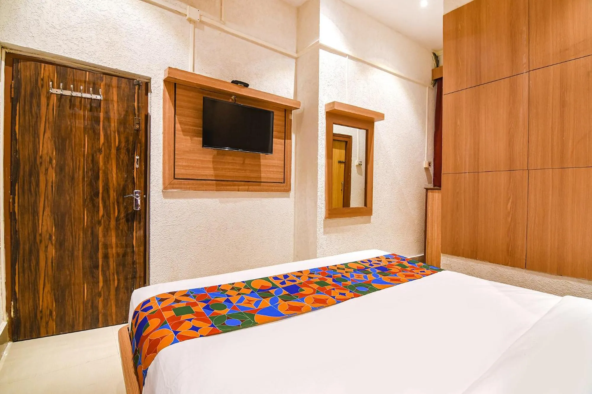 Bed in FabHotel Marina