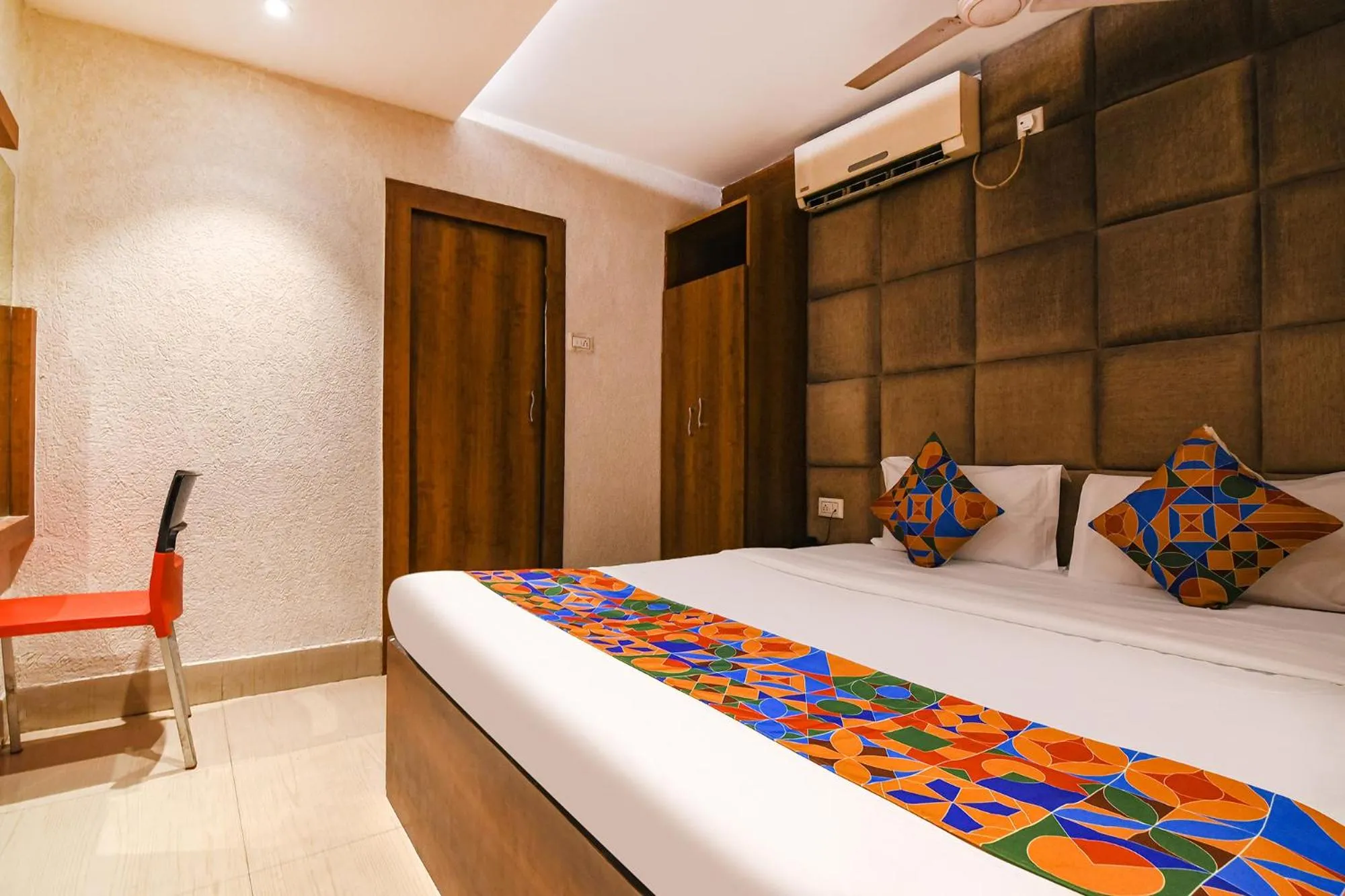 Bed in FabHotel Marina